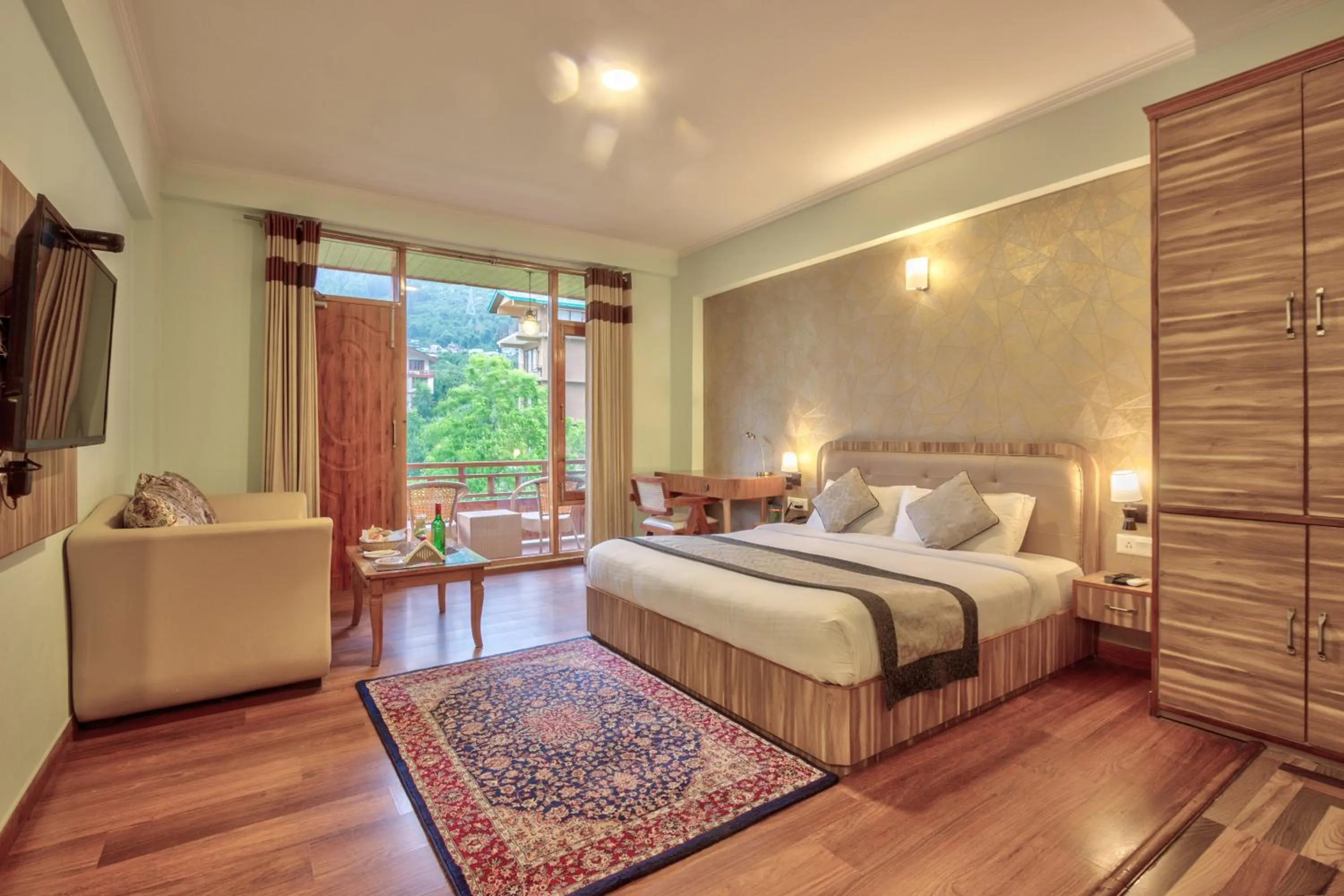 Bed in Snow Flakes Resort And Spa Centrally Heated Luxury Resort