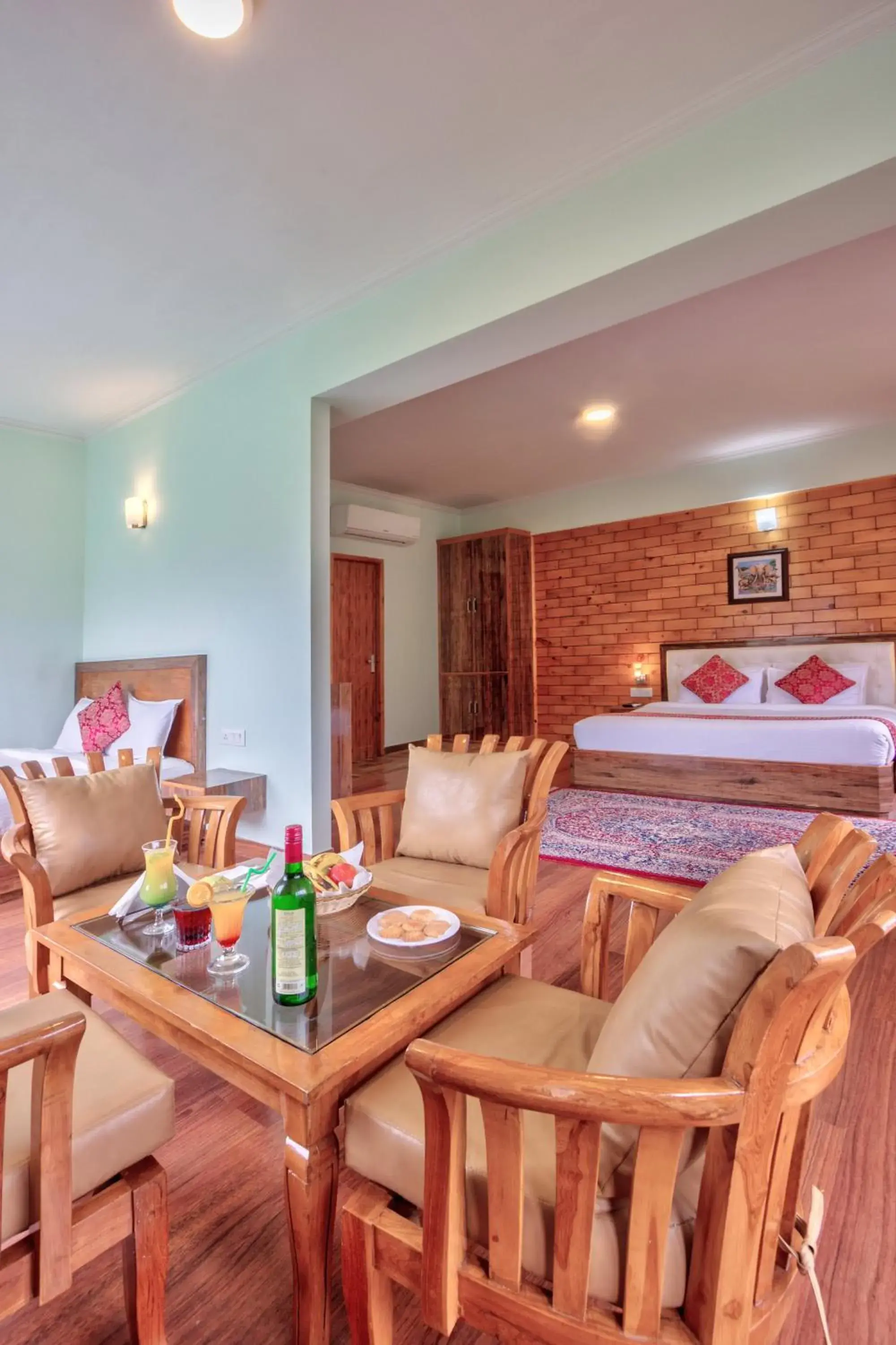 Seating area, Bed in Snow Flakes Resort And Spa Centrally Heated Luxury Resort Seating area, Bed in Snow Flakes Resort And Spa Centrally Heated Luxury Resort