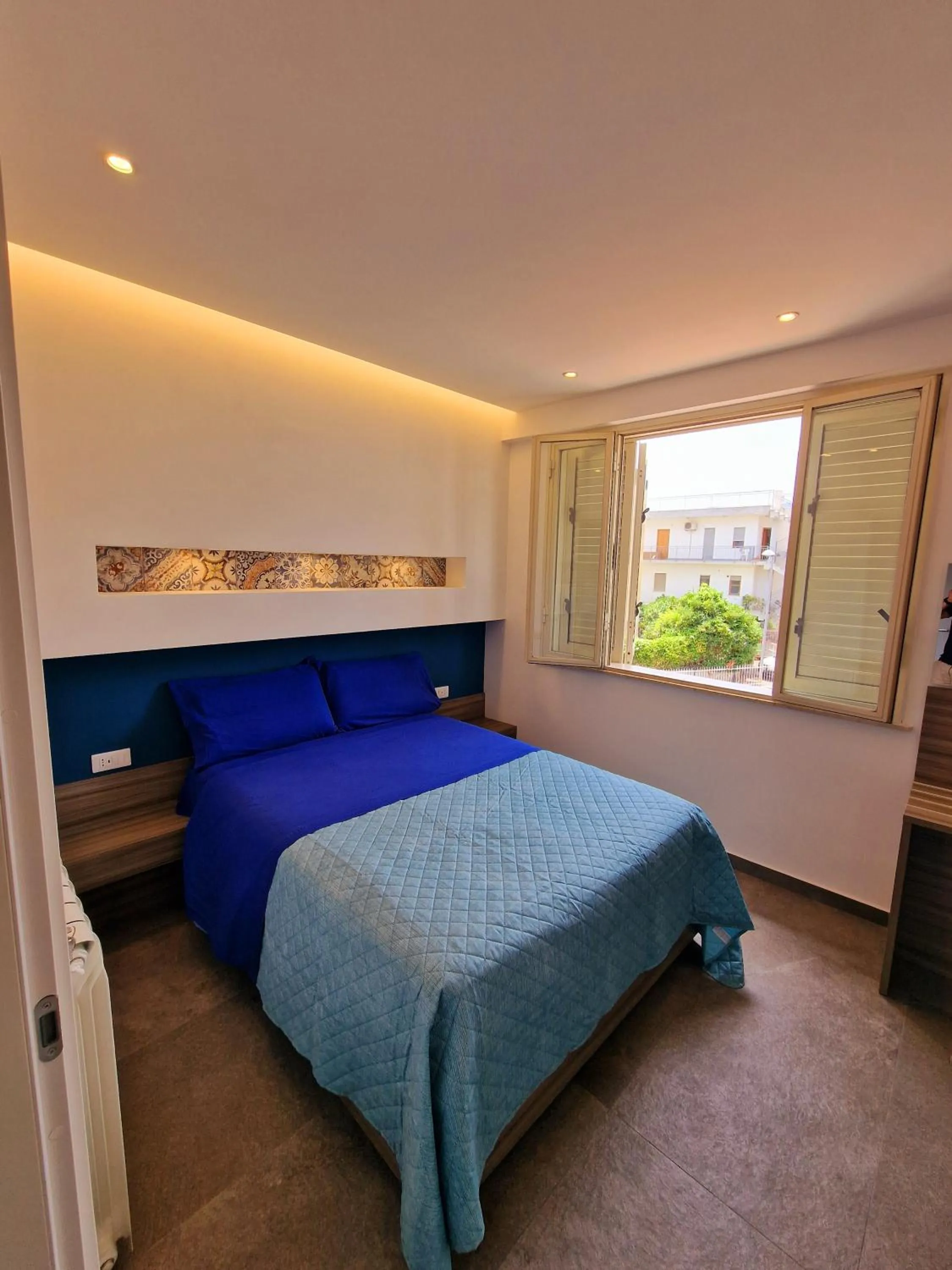 Bed in Mongibello Palace B&B