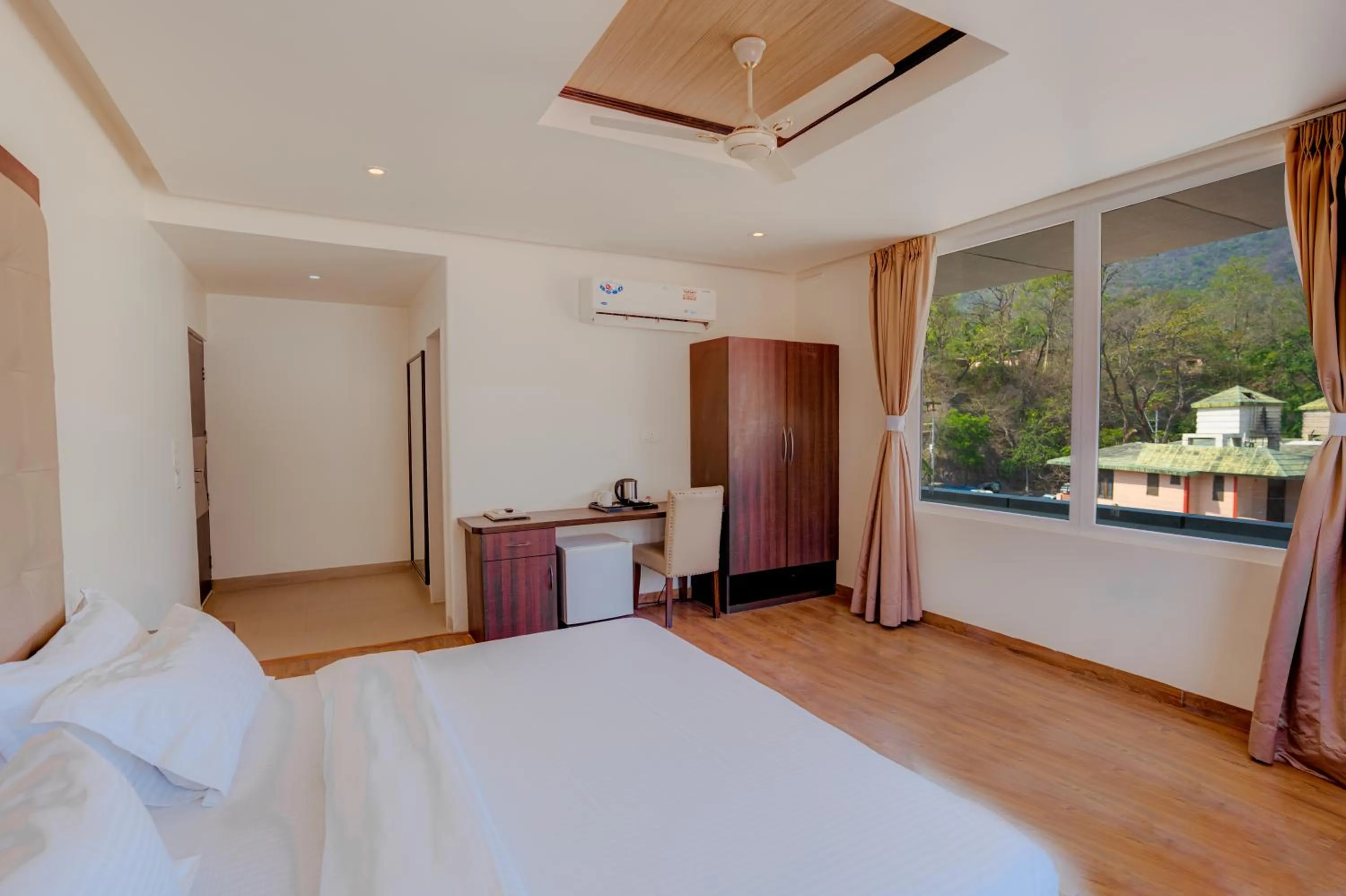 Bed in Hotel Vasundhara Palace