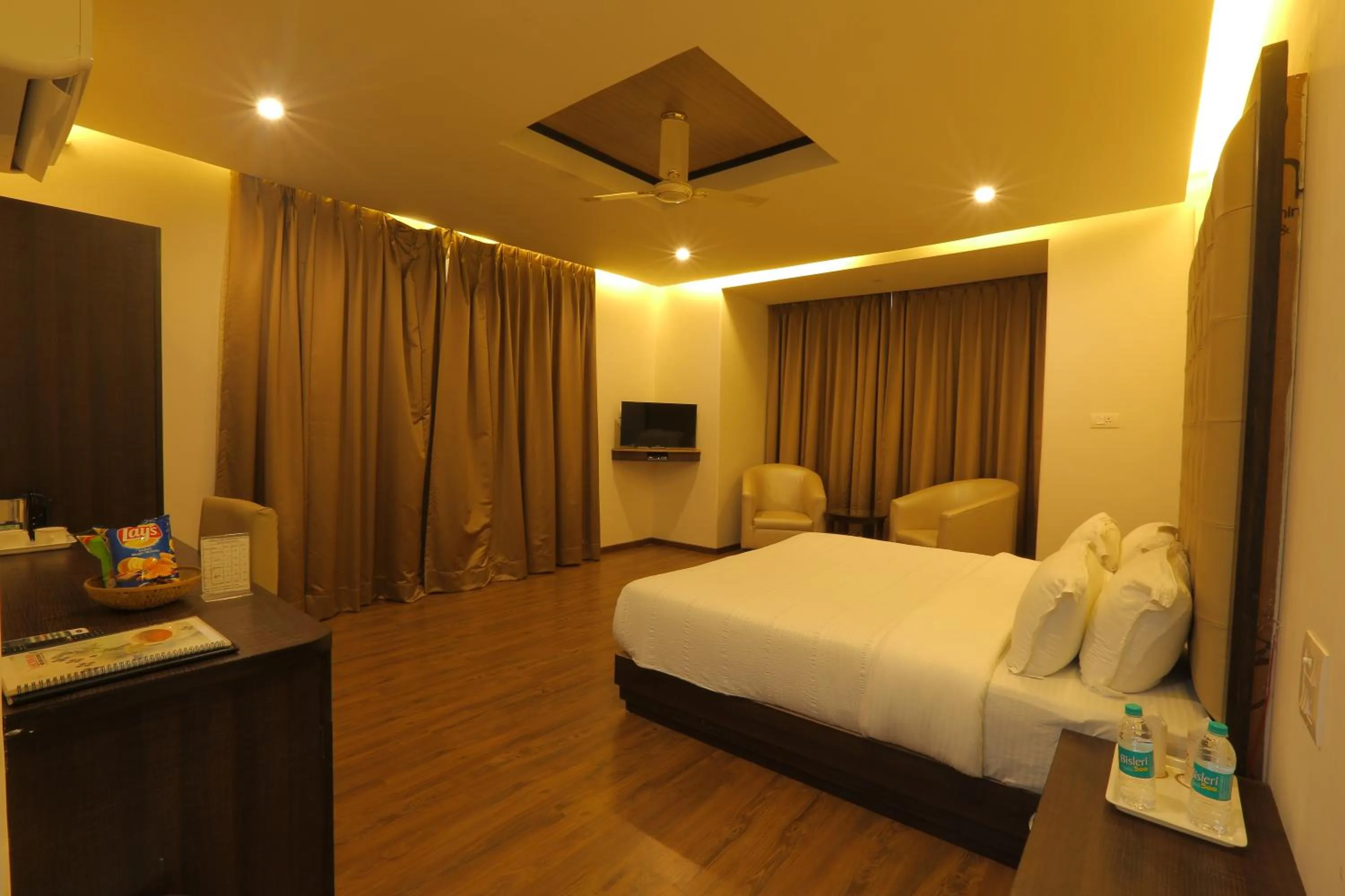 Bed in Hotel Vasundhara Palace