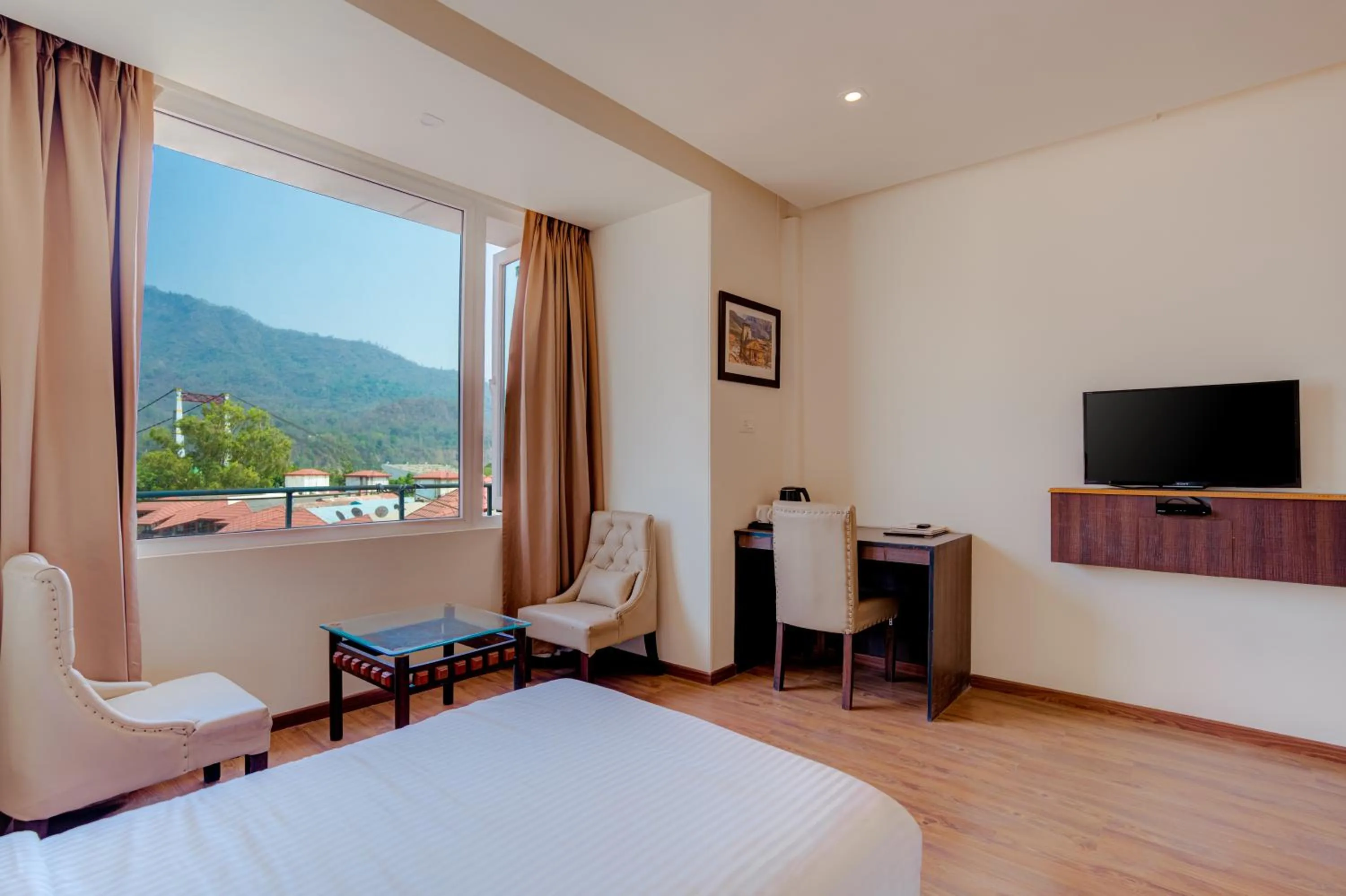 Bed in Hotel Vasundhara Palace