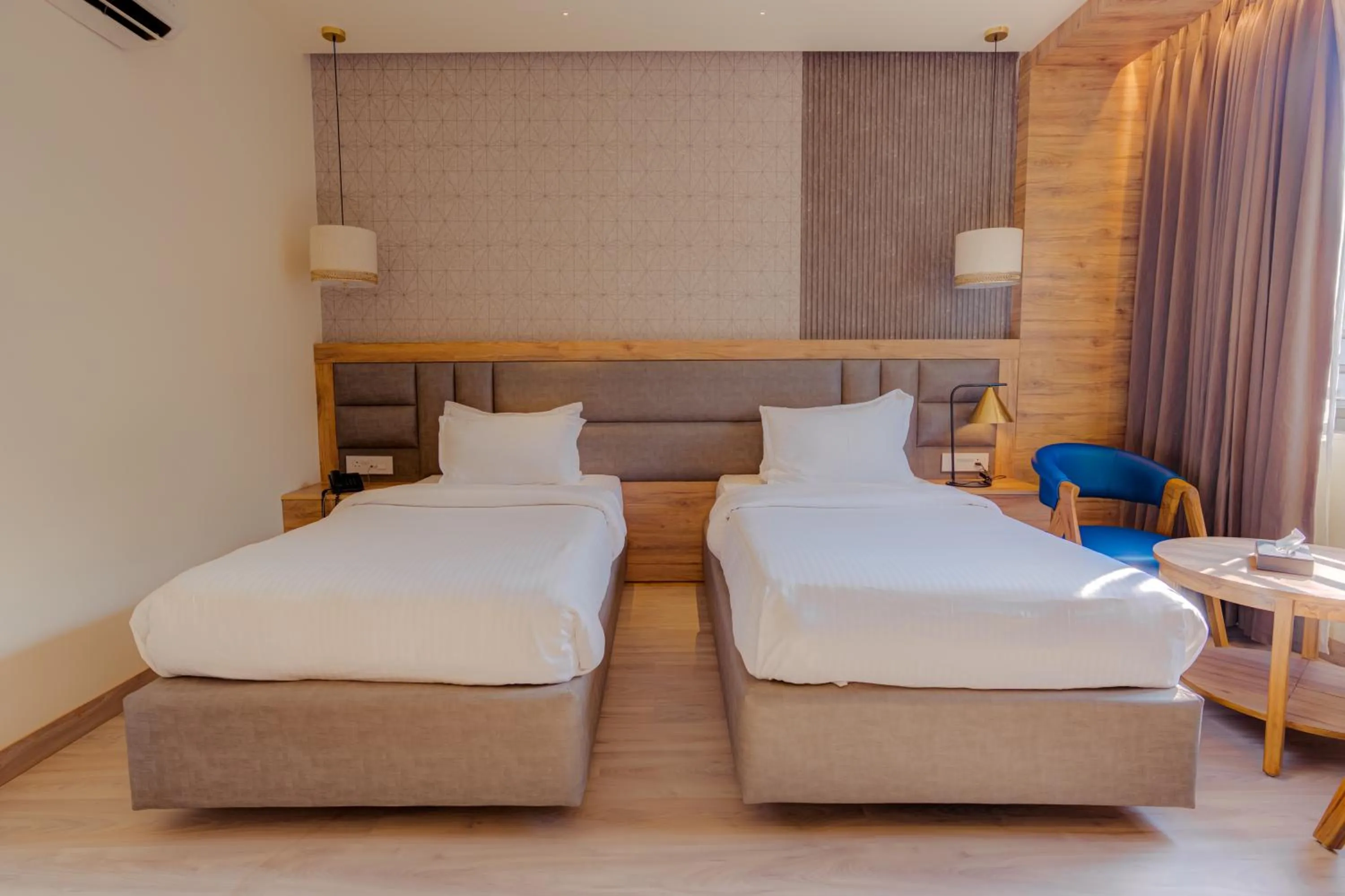 Bed in Hotel Vasundhara Palace