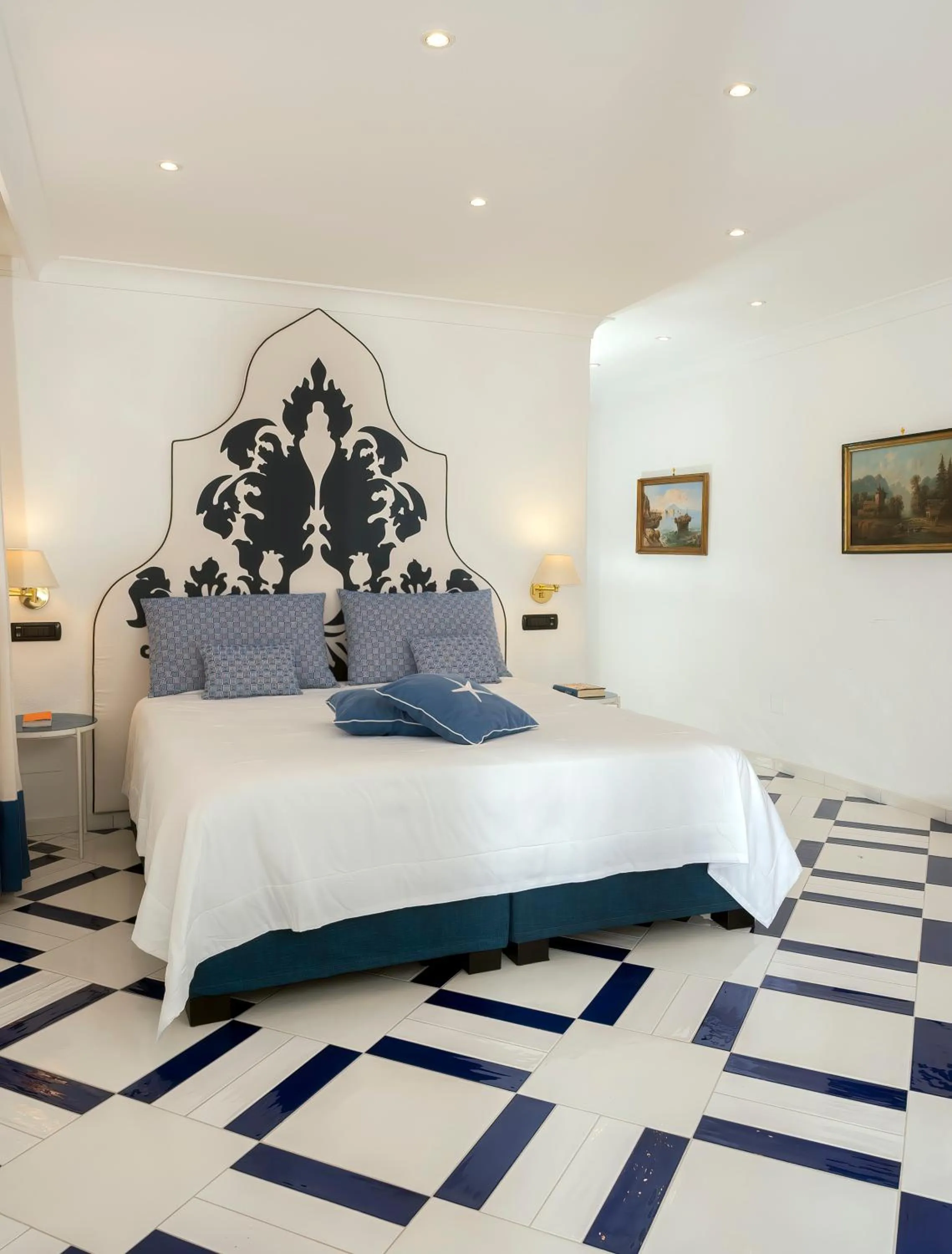 Bed in Hotel Le Agavi