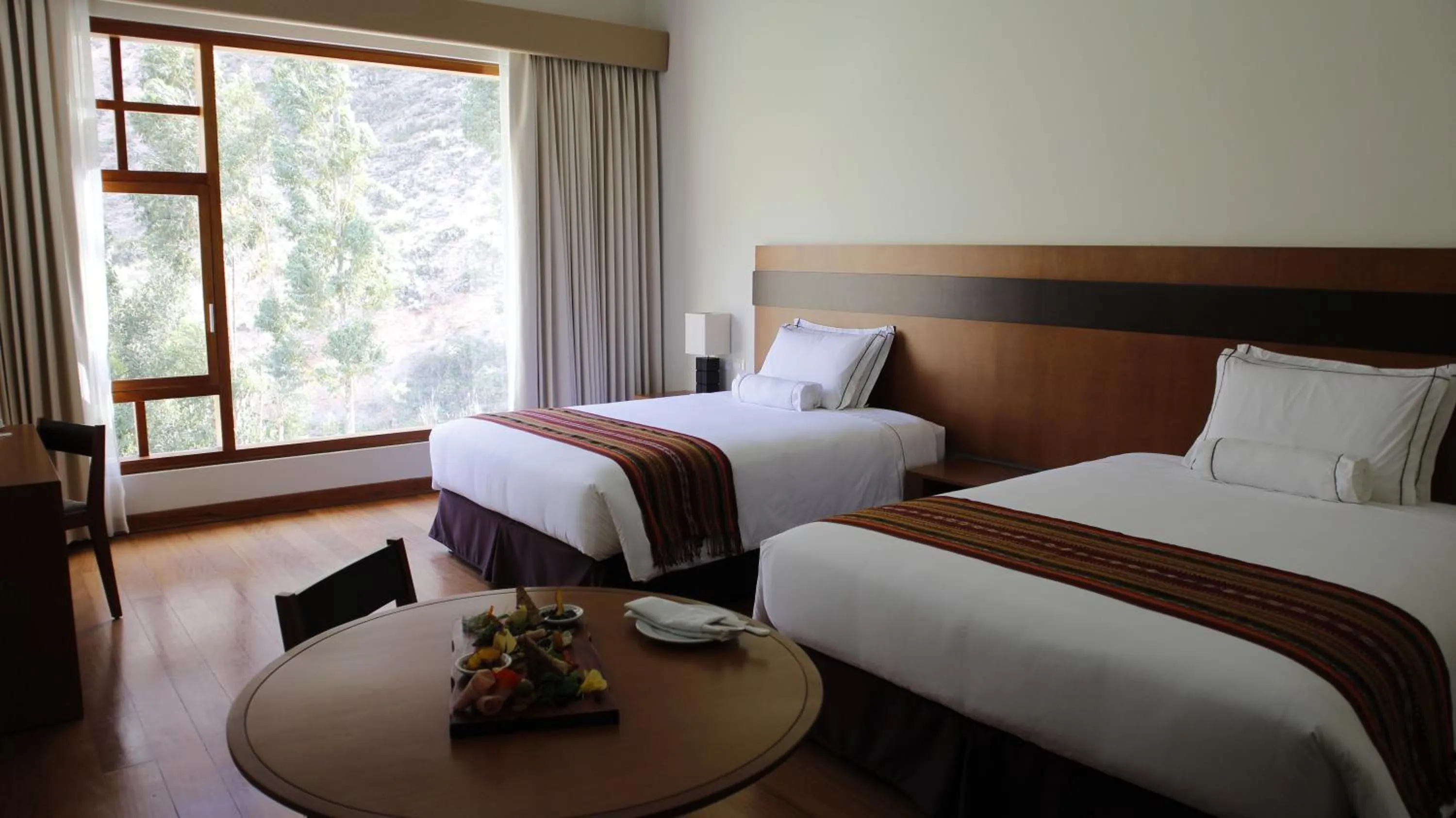 Photo of the whole room, Bed in Taypikala Deluxe Valle Sagrado