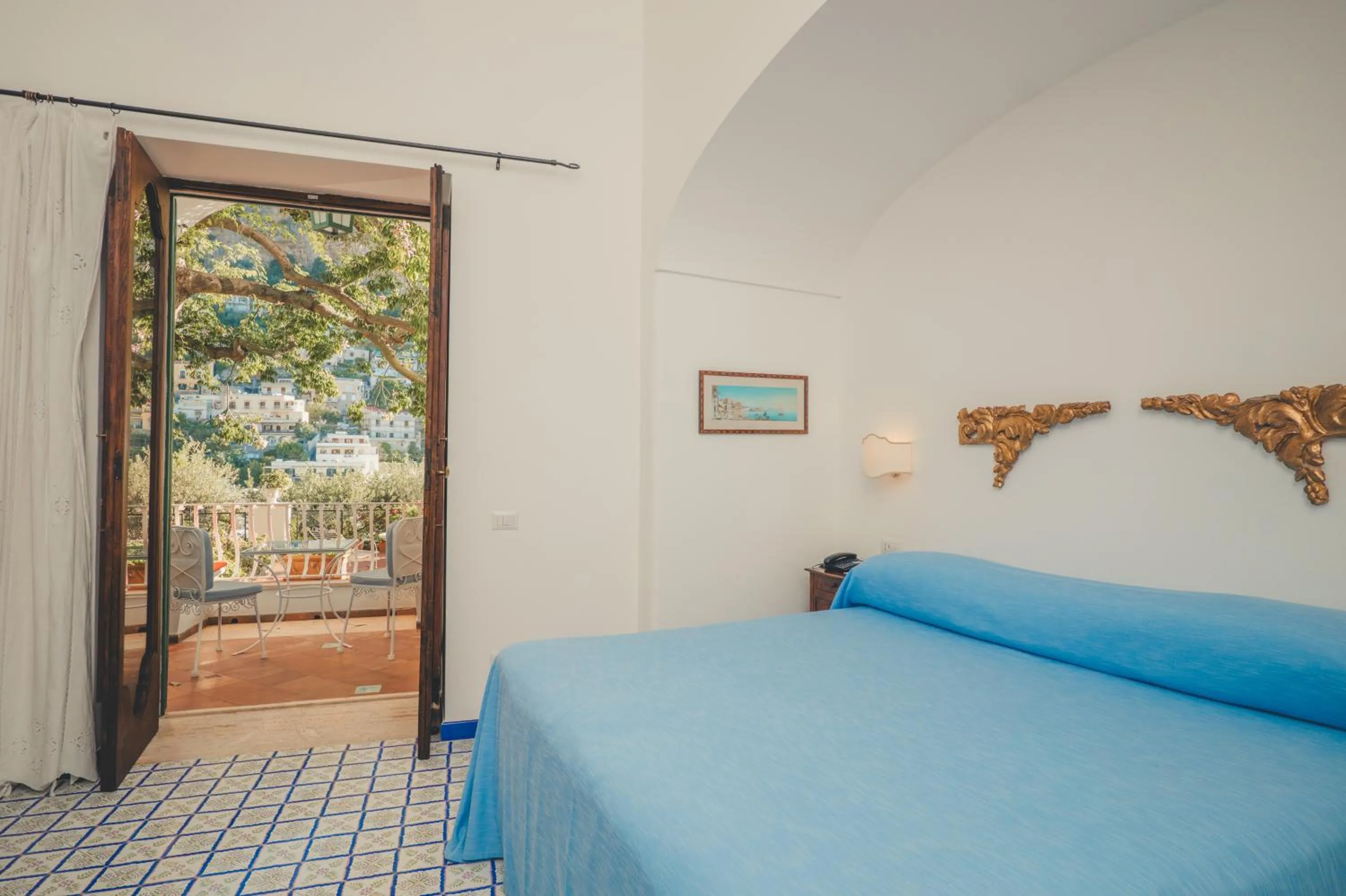 Bed in Hotel Poseidon