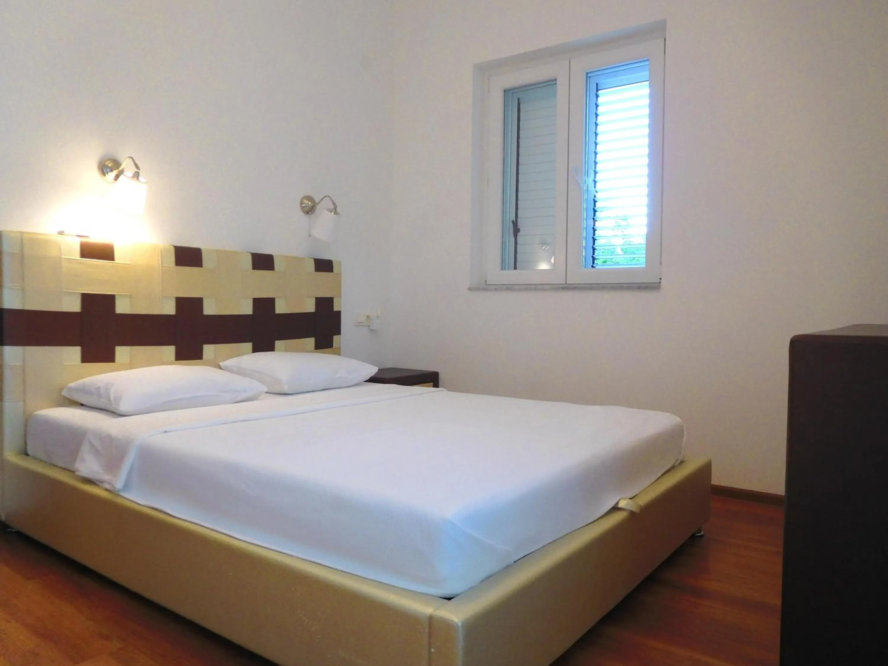 Bed in Apartments Sunrise