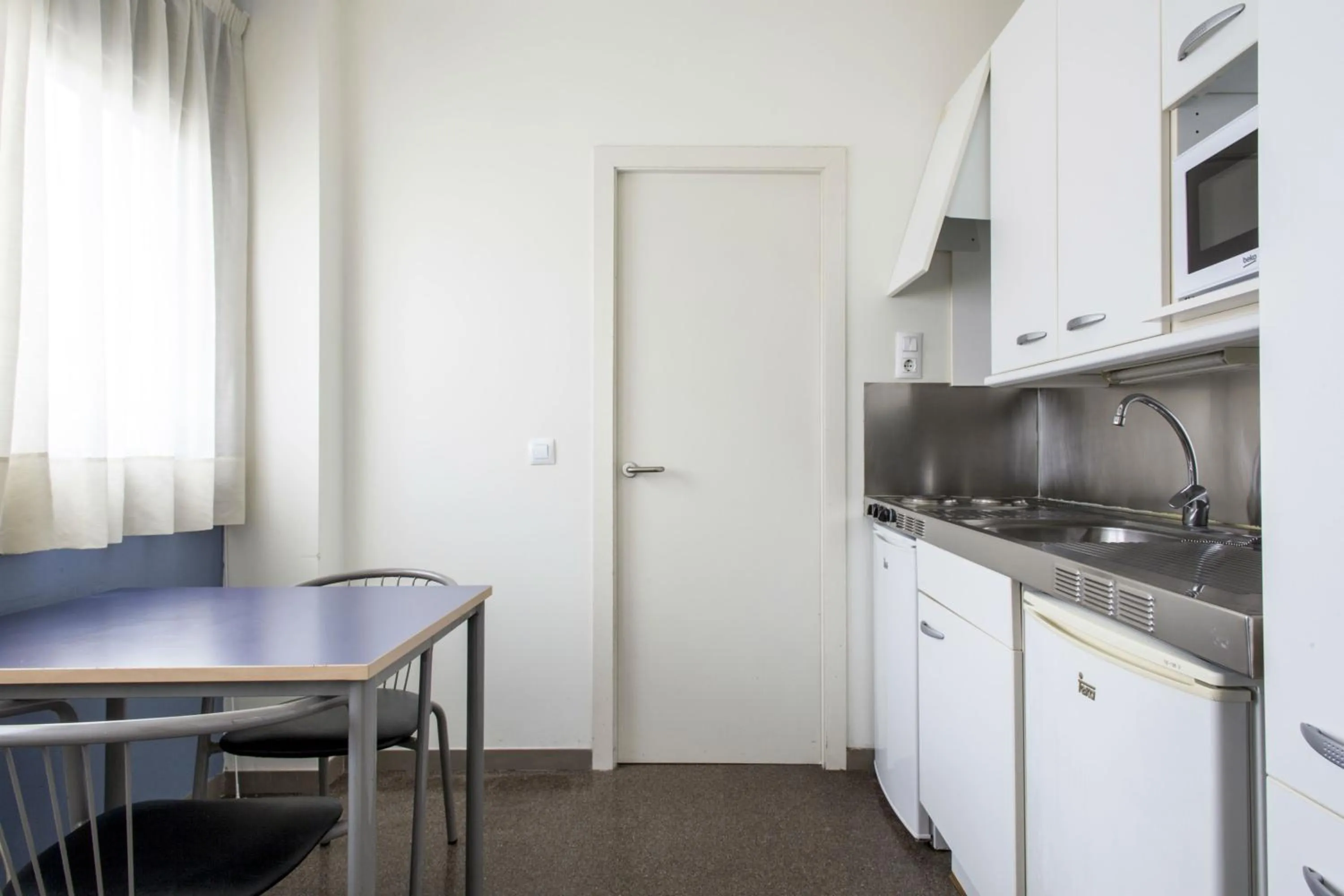 Kitchen or kitchenette in Residencia Universitaria Resa As Burgas