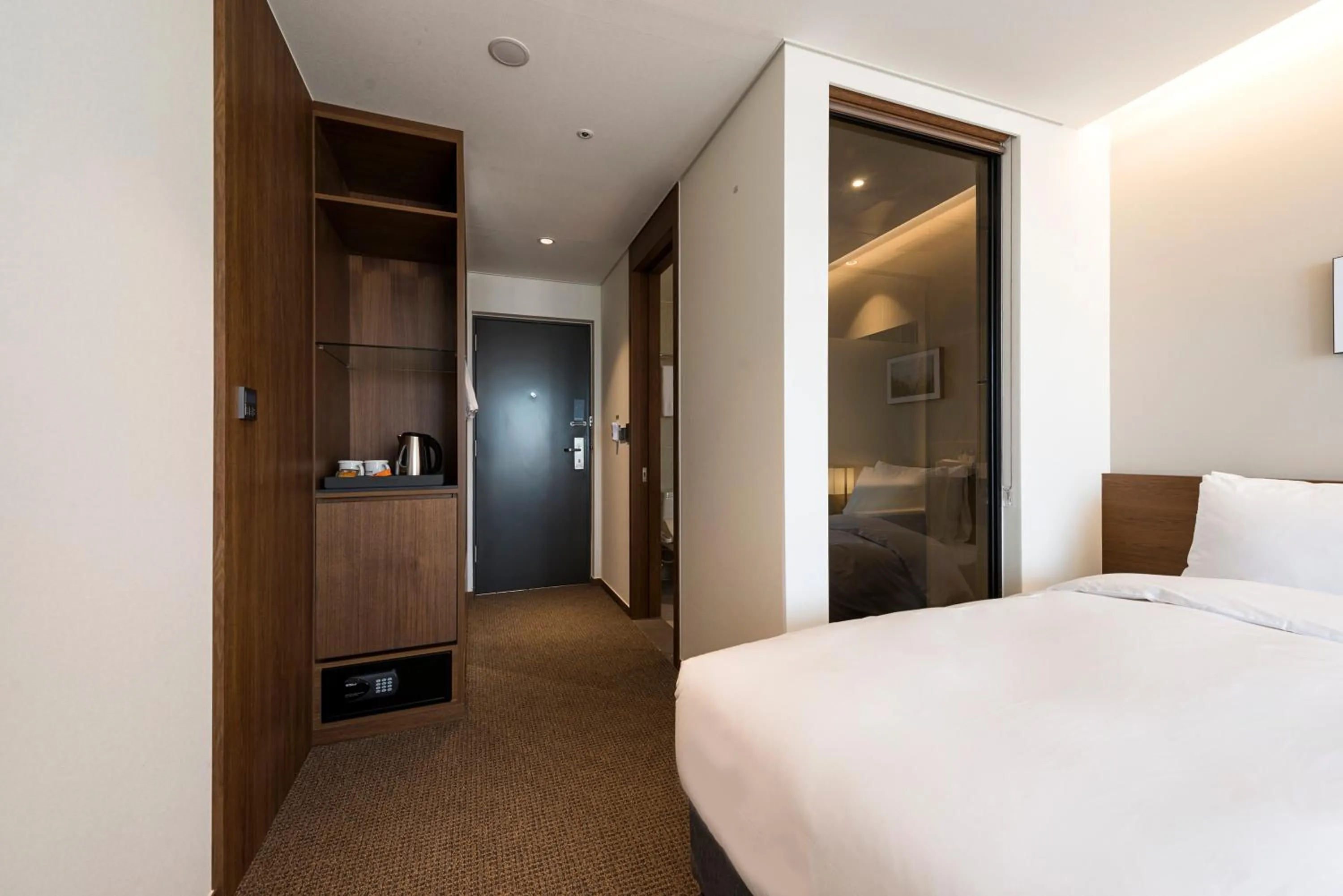 Bed in Ramada Encore by Wyndham Busan Haeundae