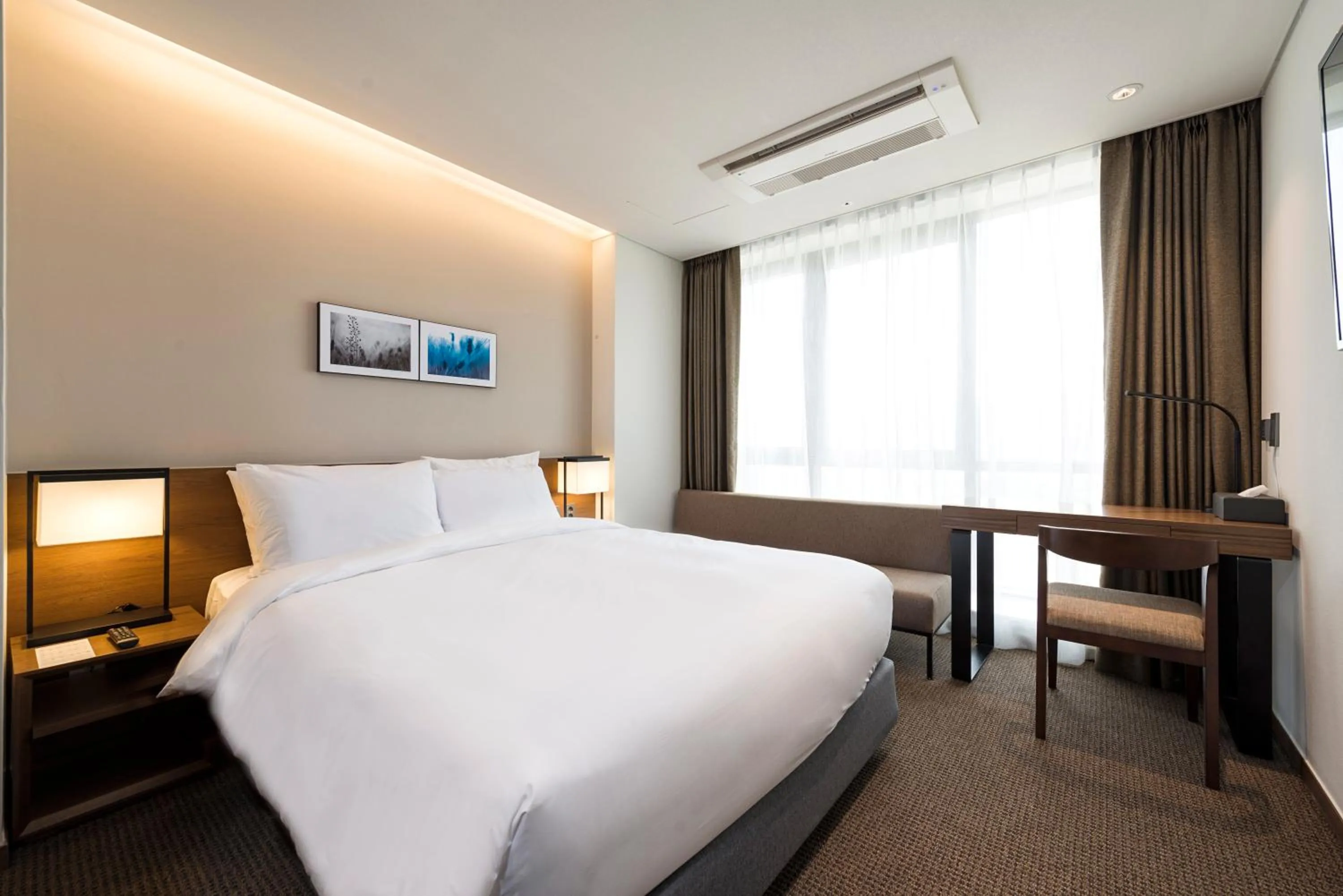 Bedroom, Bed in Ramada Encore by Wyndham Busan Haeundae