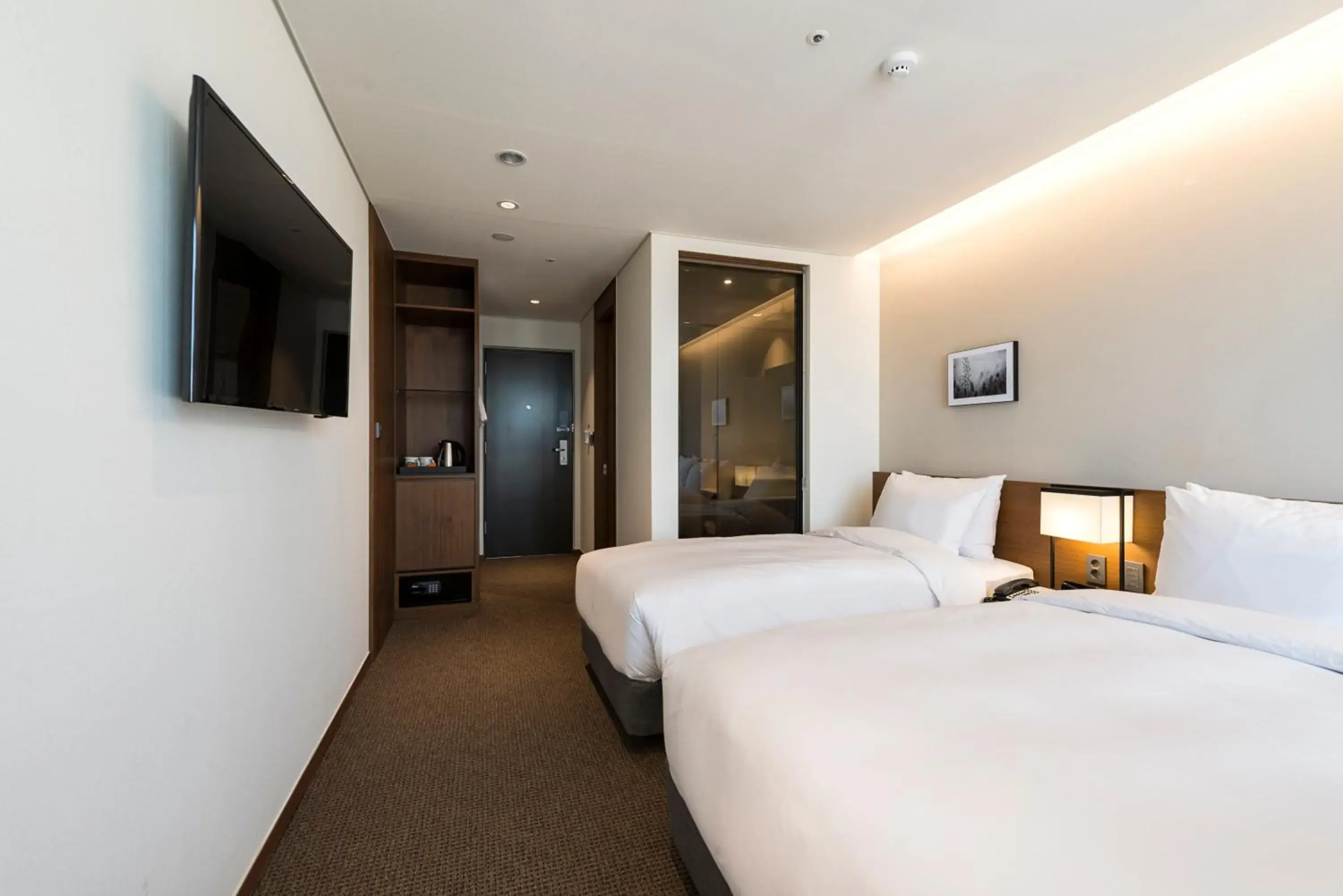 Bed in Ramada Encore by Wyndham Busan Haeundae Bed in Ramada Encore by Wyndham Busan Haeundae