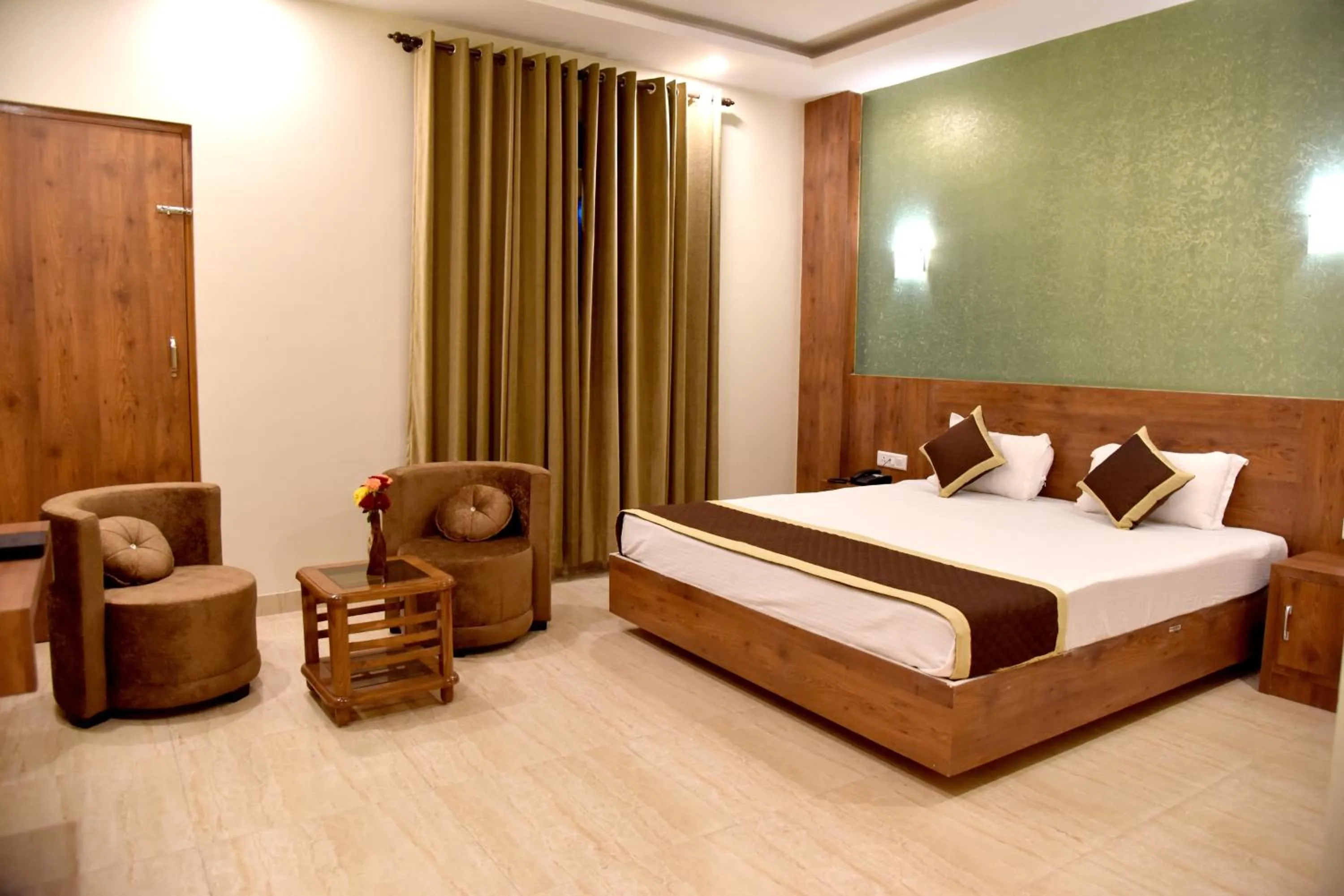 Photo of the whole room, Bed in Hotel Triveni Residency