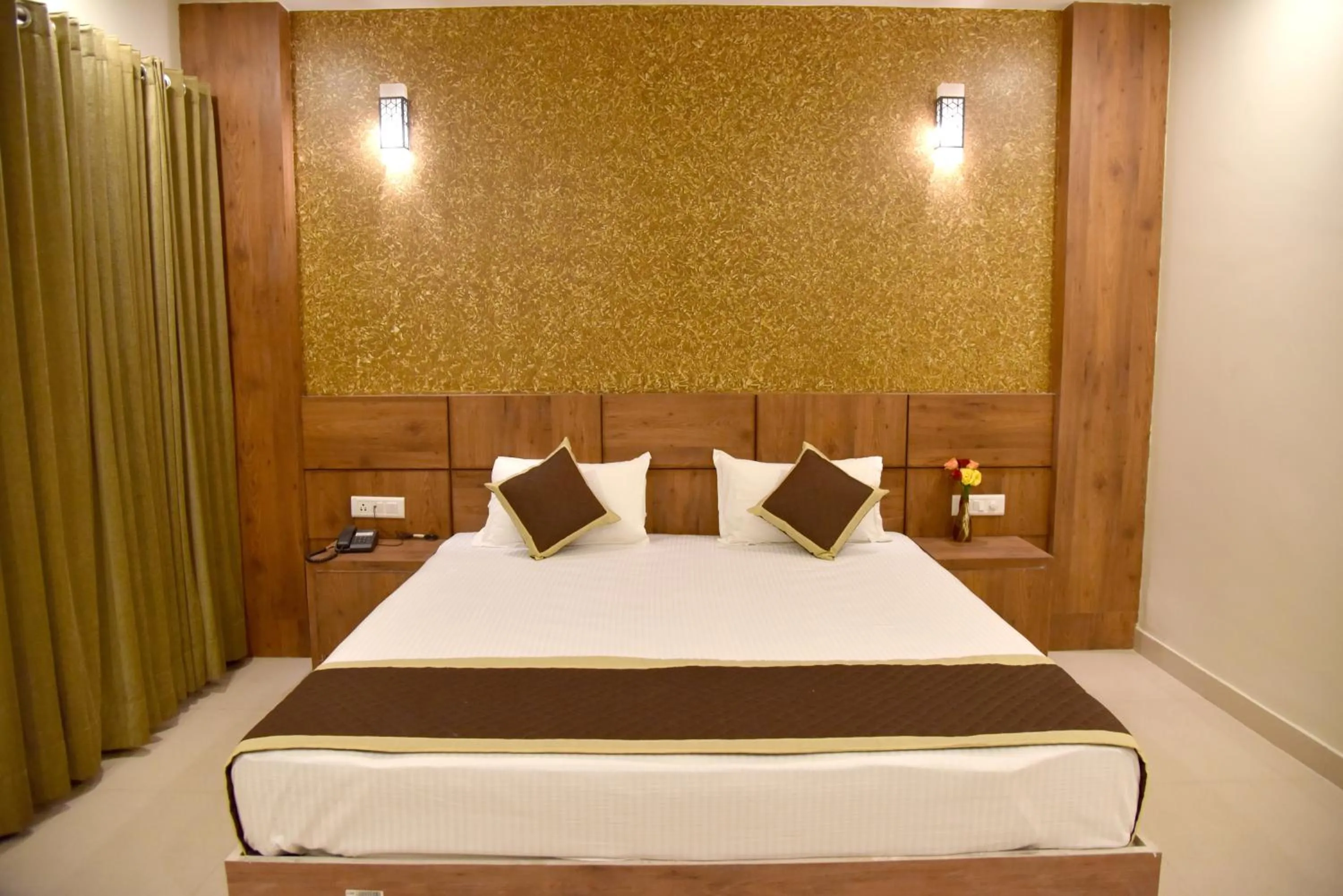 Photo of the whole room, Bed in Hotel Triveni Residency