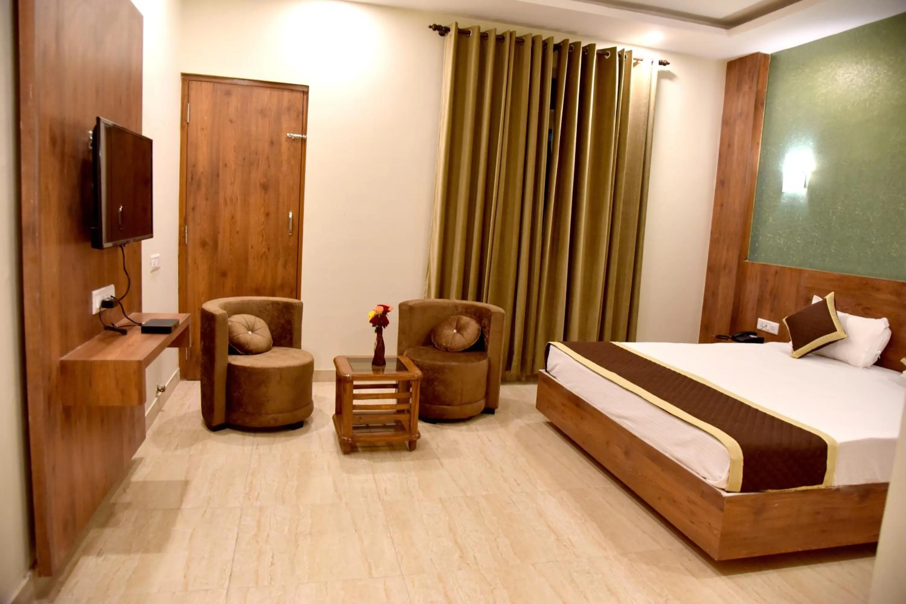 Photo of the whole room, Bed in Hotel Triveni Residency