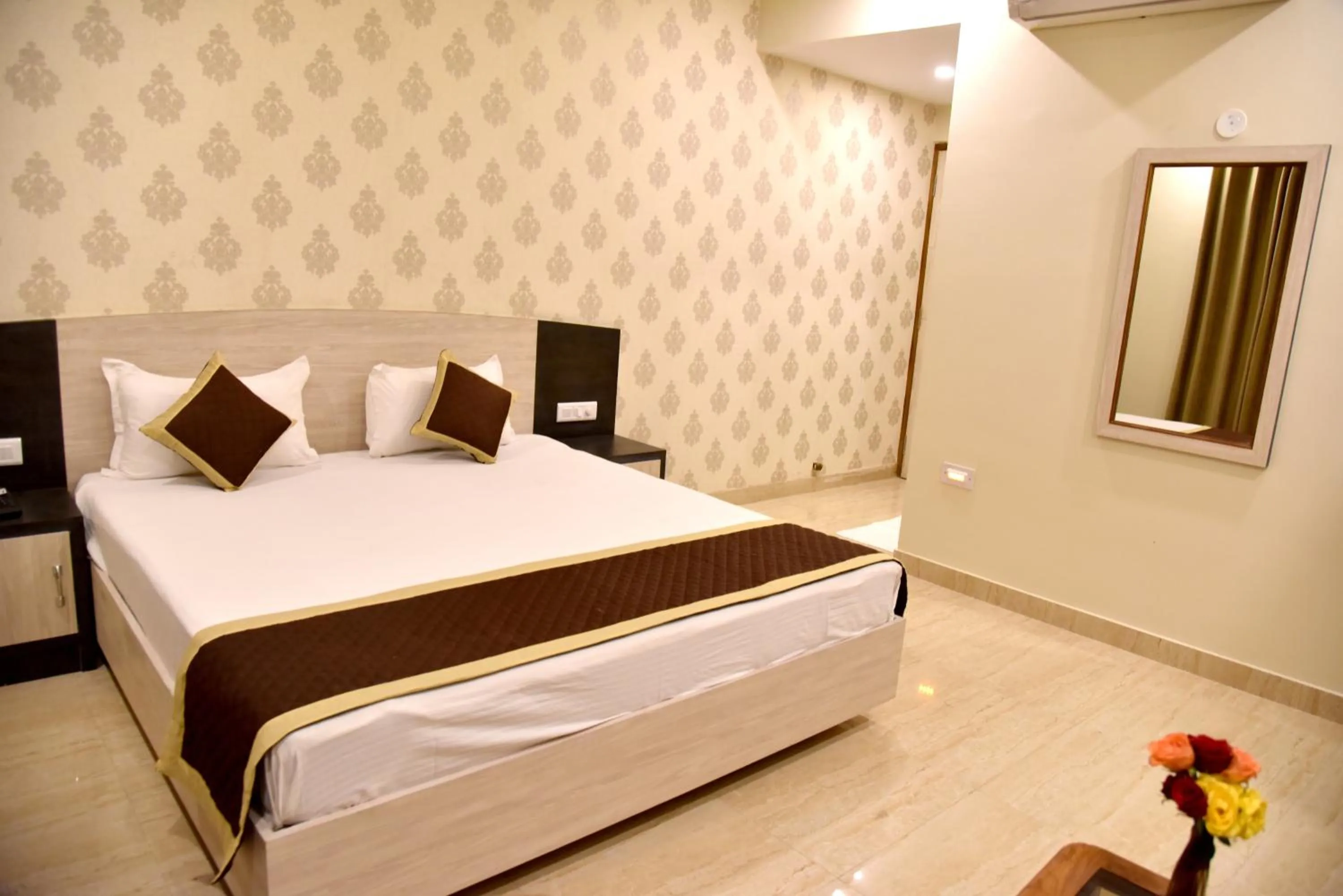 Bed in Hotel Triveni Residency