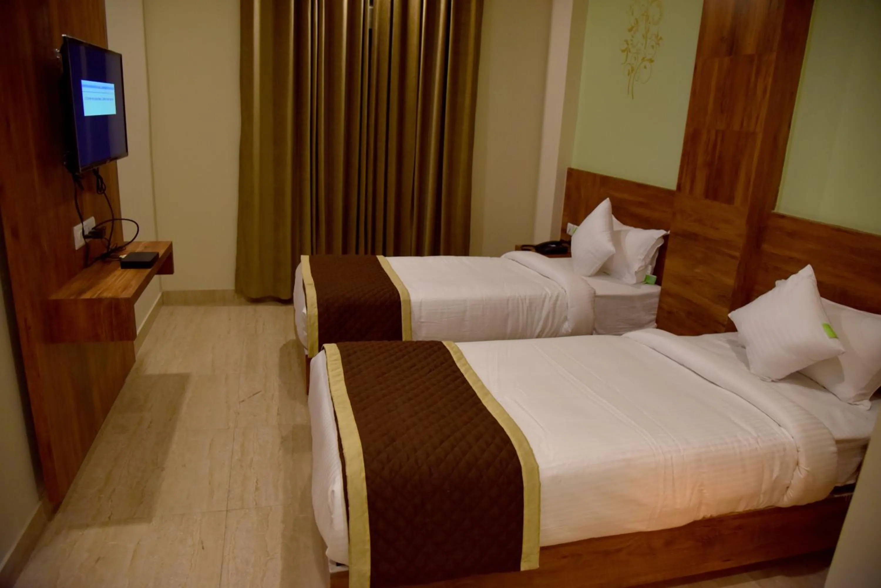 Photo of the whole room, Bed in Hotel Triveni Residency
