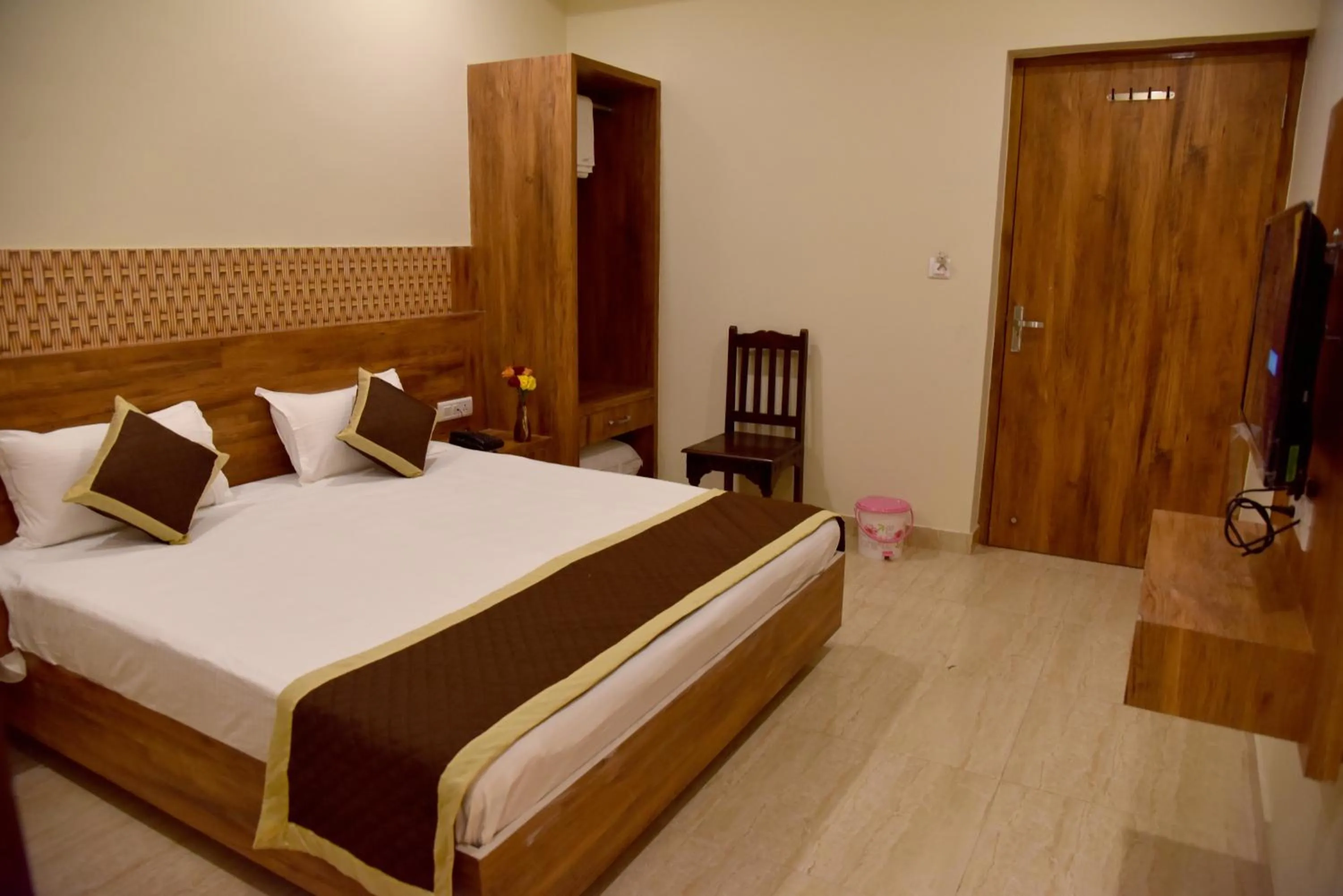 Photo of the whole room, Bed in Hotel Triveni Residency
