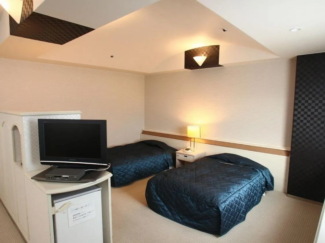 Bedroom, Bed in Sakaide Grand Hotel