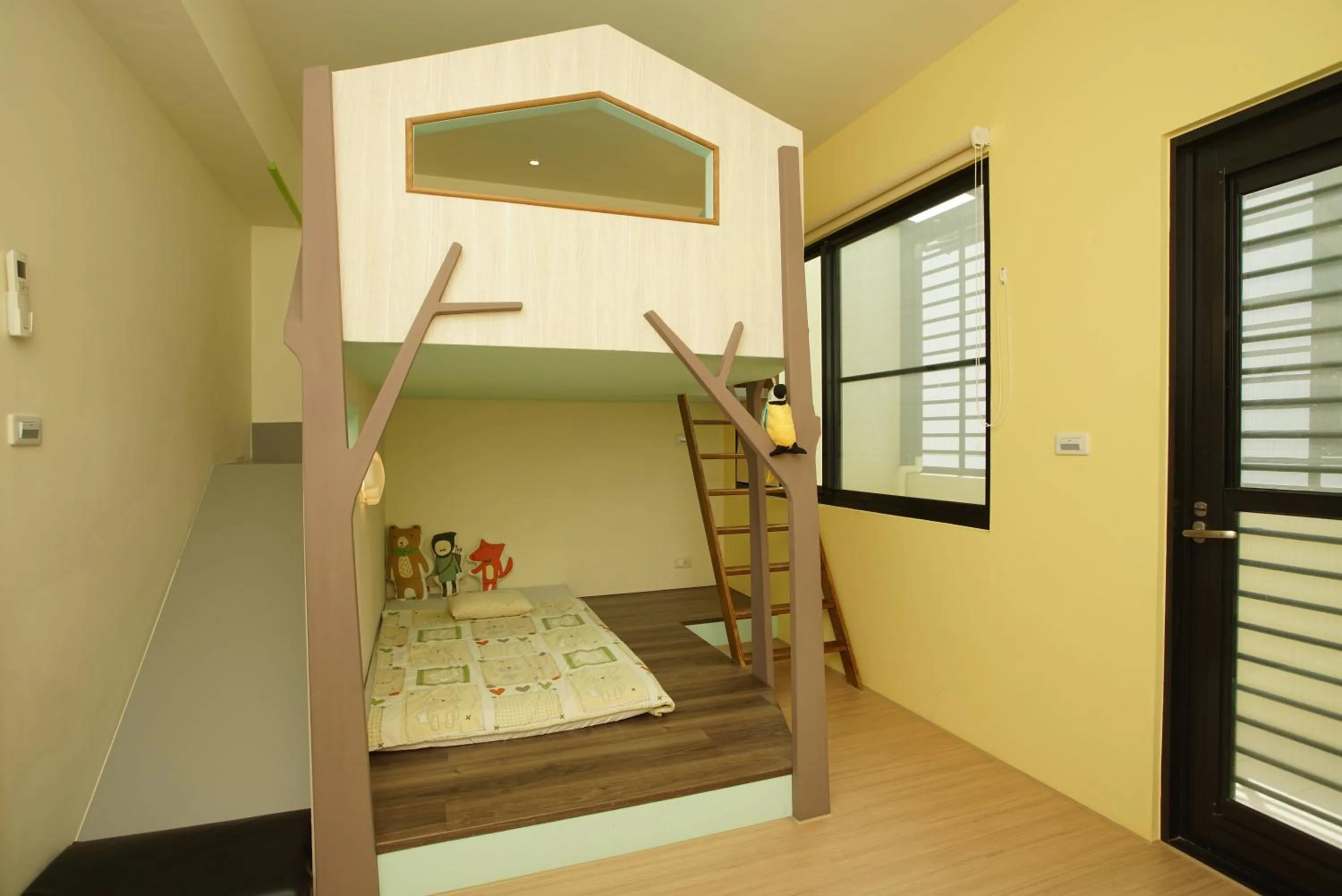 Bed in 胖蝸牛親子民宿