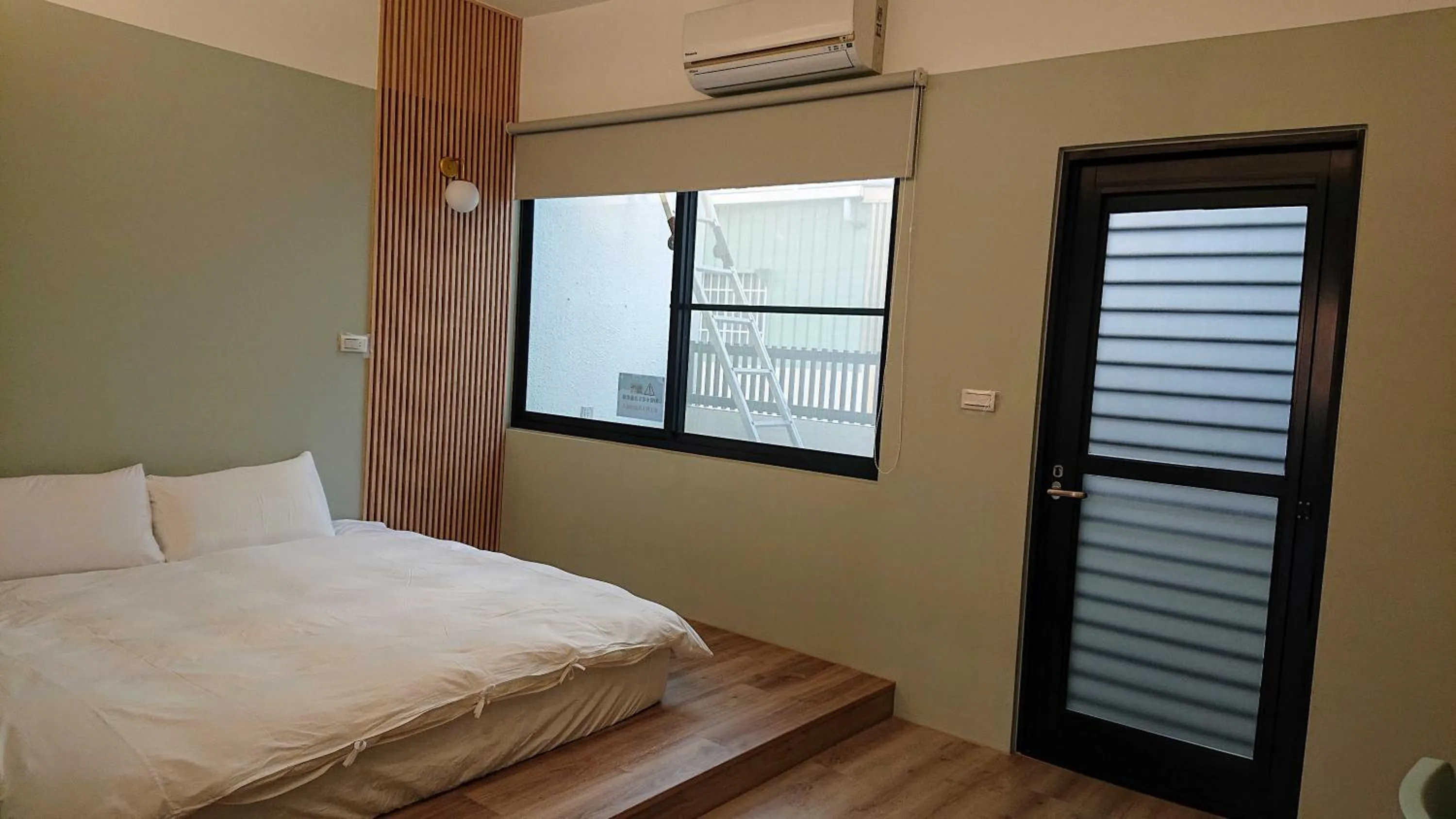 Bed in 胖蝸牛親子民宿