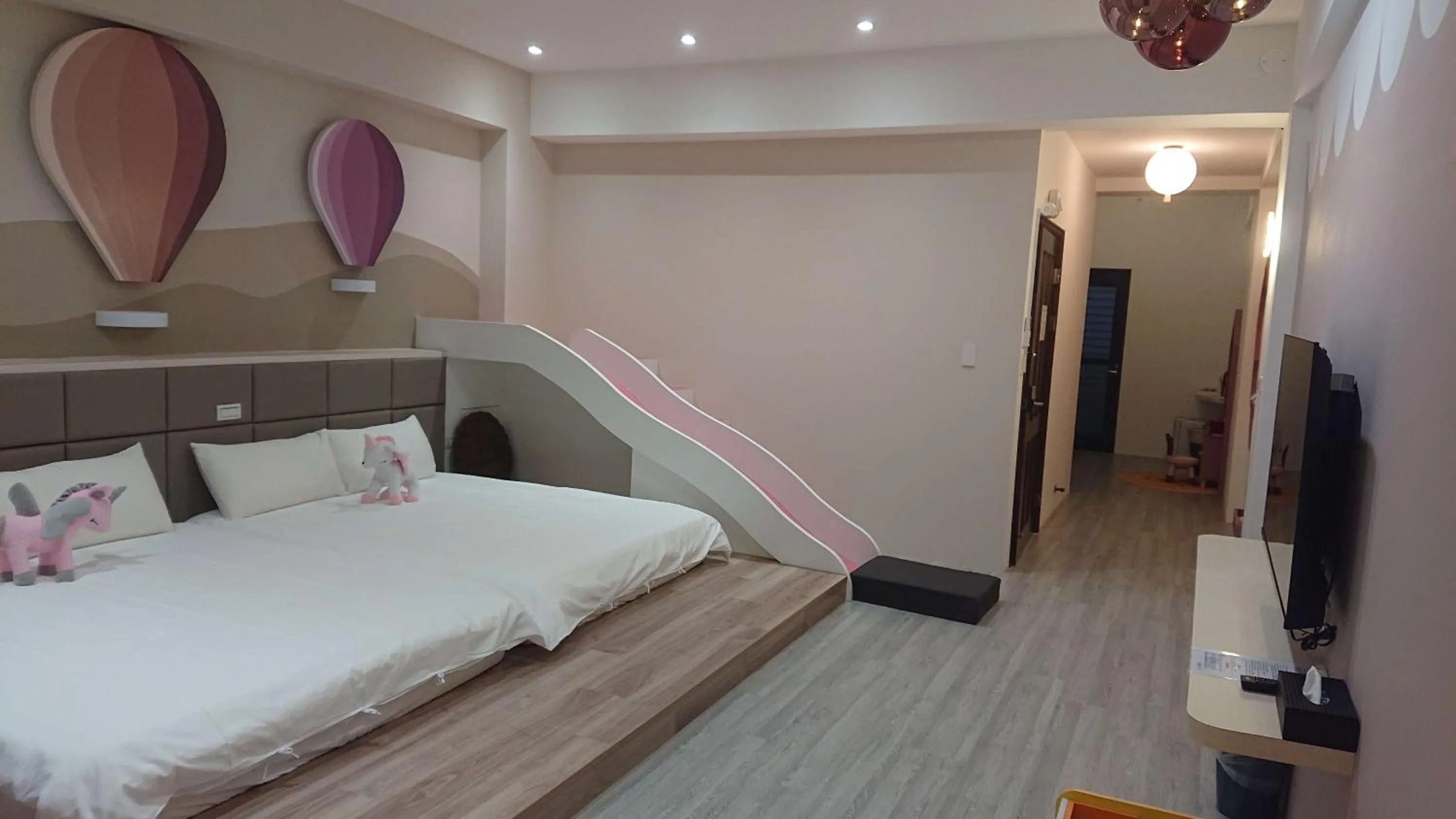 Bed in 胖蝸牛親子民宿