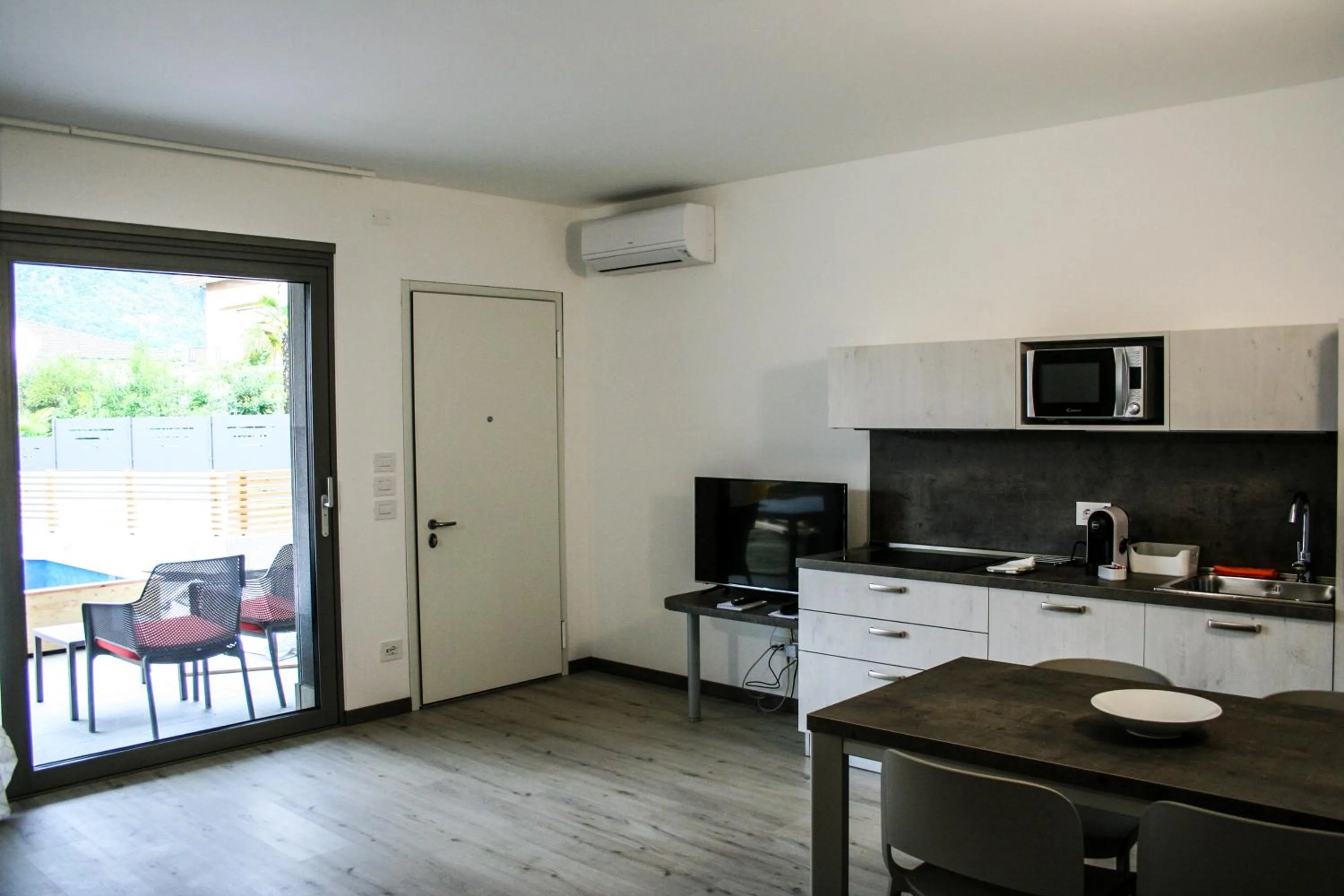 Kitchen or kitchenette in GardaBreak Rooms&Breakfast Holiday Apartments