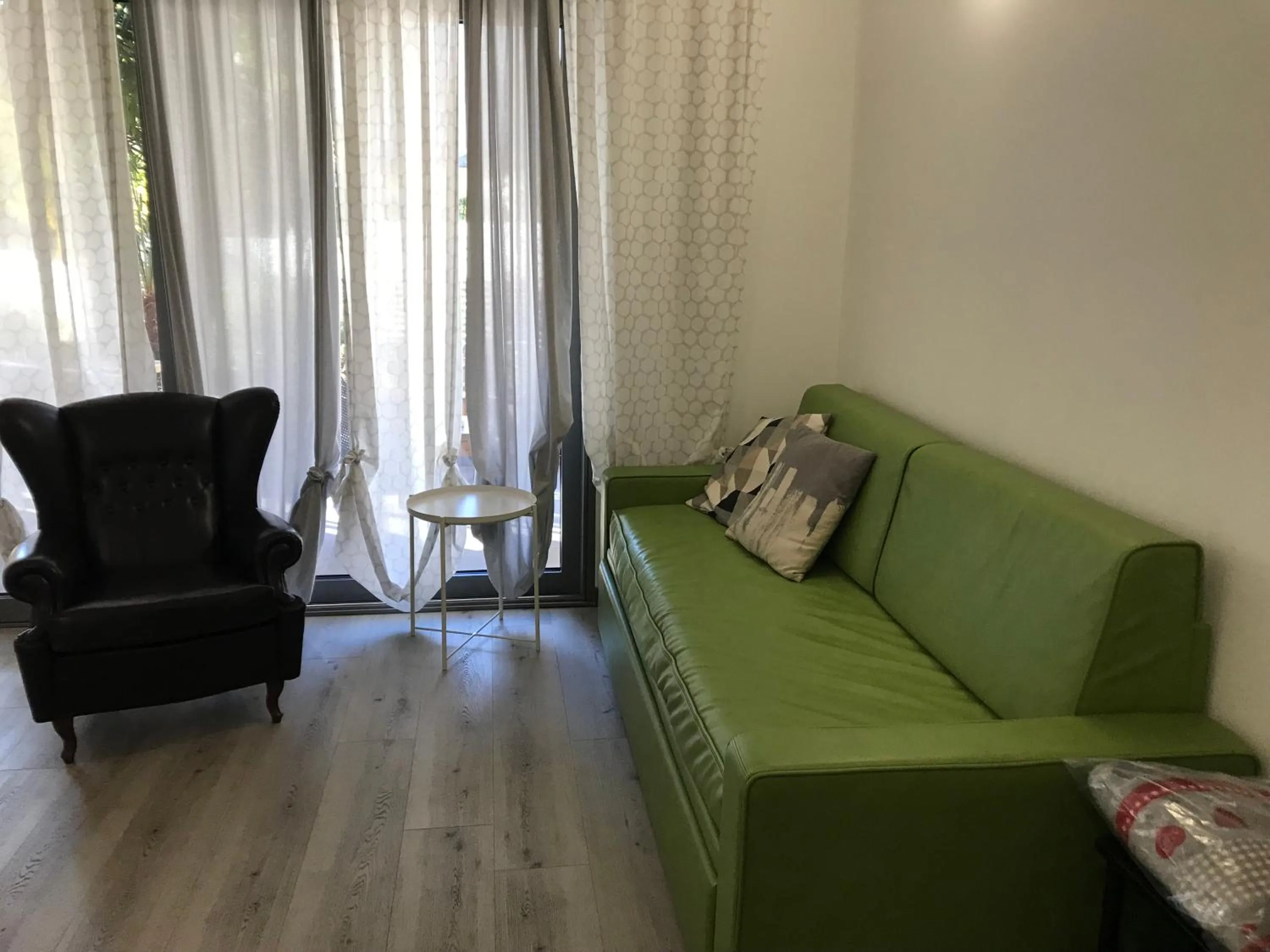 Living room in GardaBreak Rooms&Breakfast Holiday Apartments