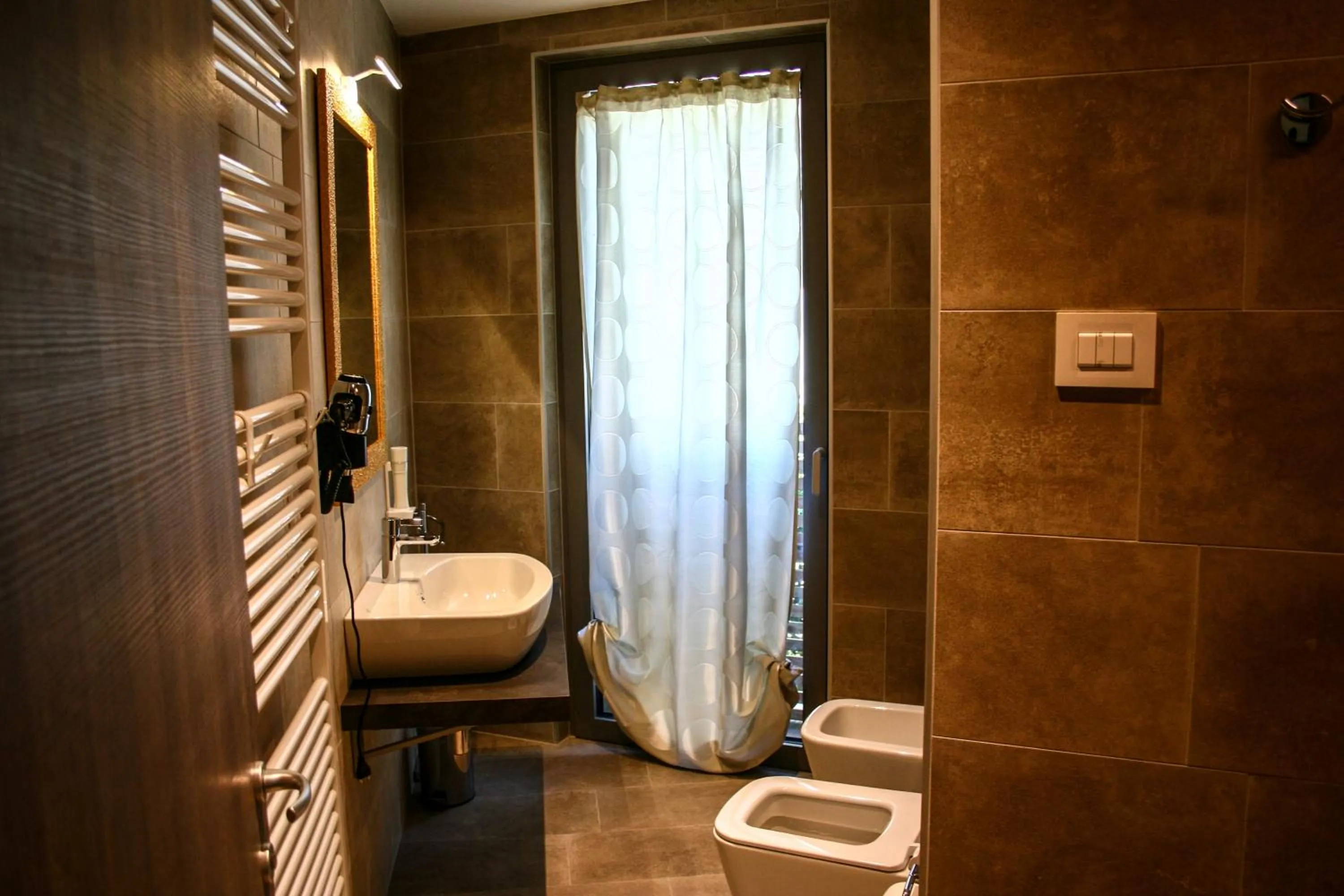 Bathroom in GardaBreak Rooms&Breakfast Holiday Apartments