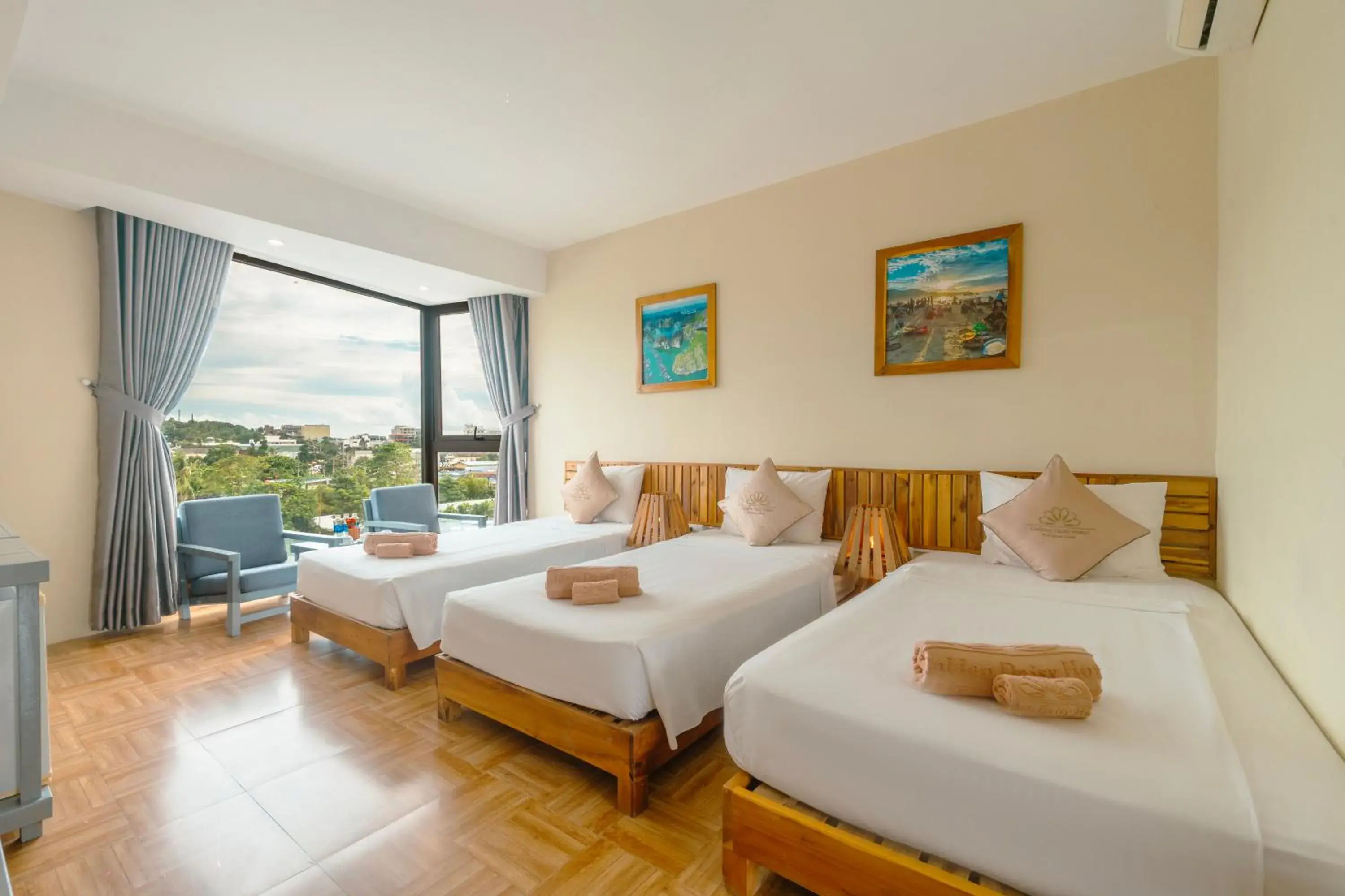 Deluxe Triple Room in Golden Daisy Hotel Phu Quoc Deluxe Triple Room in Golden Daisy Hotel Phu Quoc