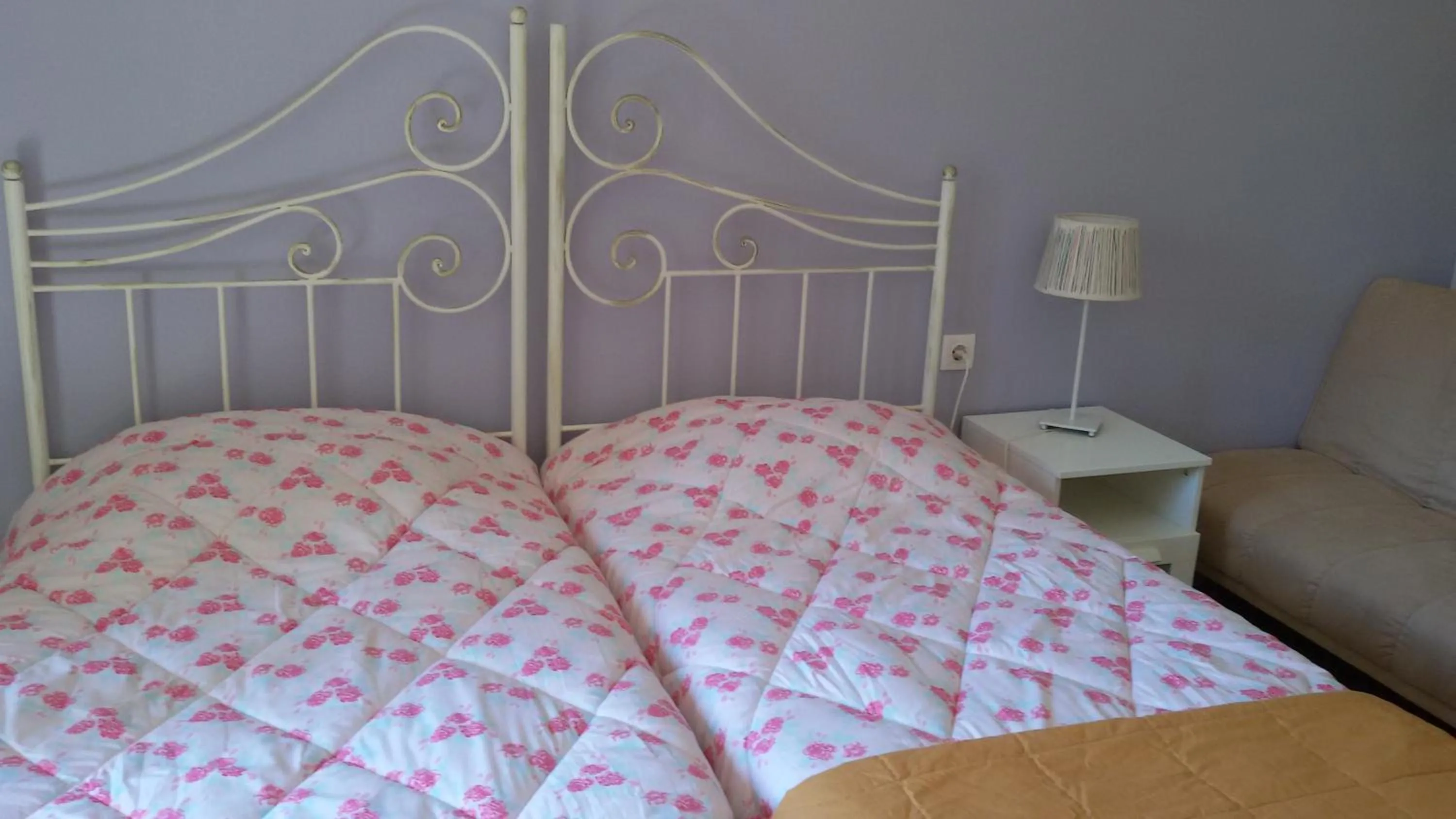 Bed in Shambala Apartments