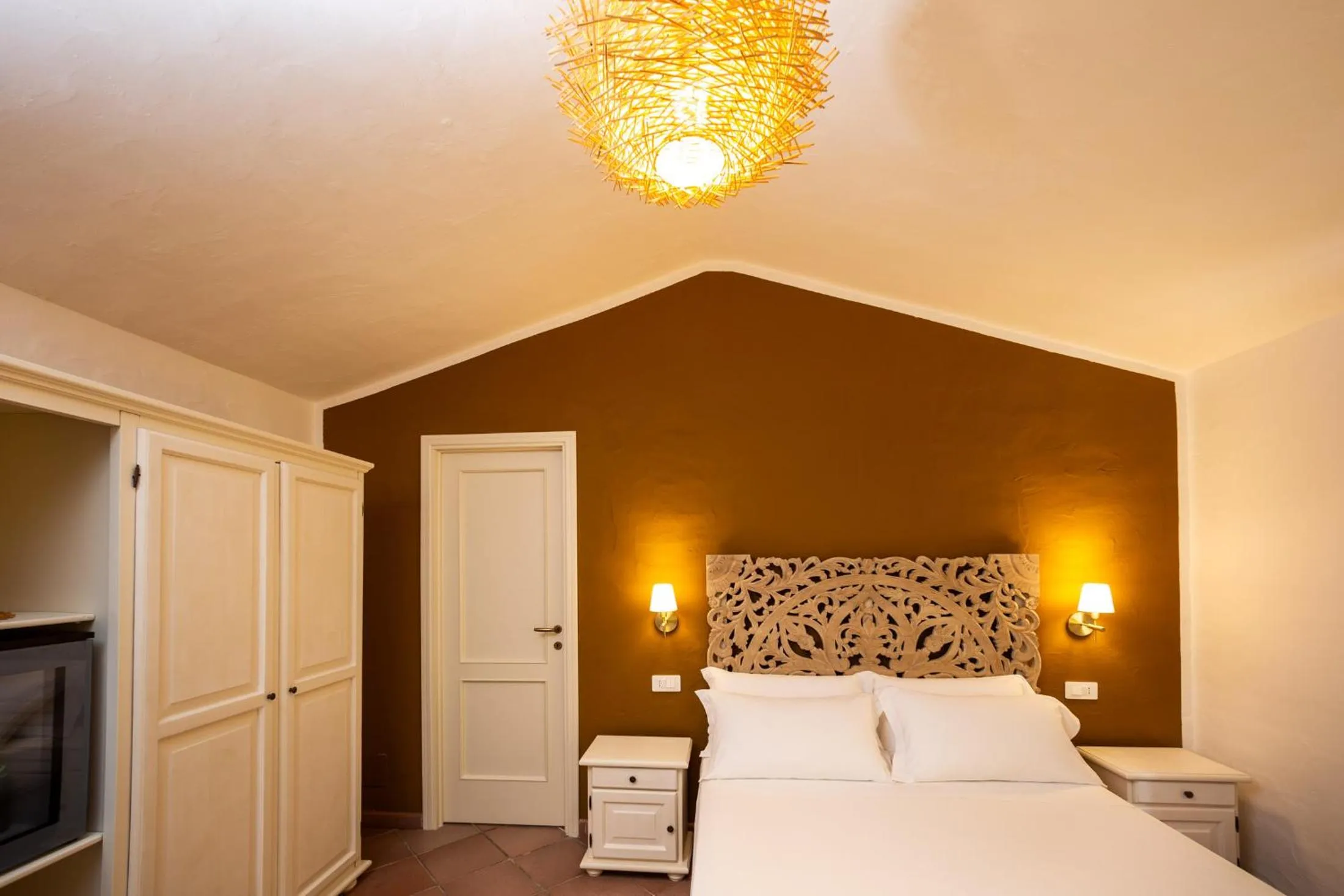 Bed in La Jacia Hotel & Resort