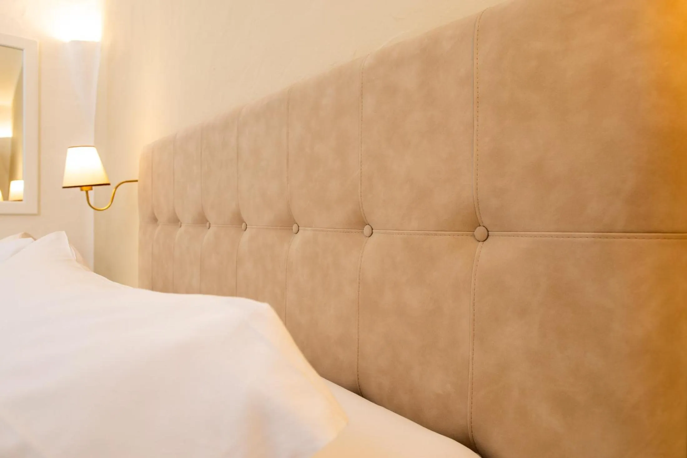 Bed in La Jacia Hotel & Resort