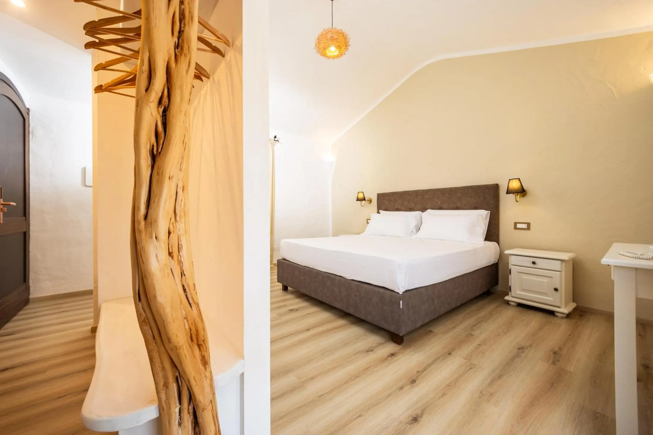 Bed in La Jacia Hotel & Resort