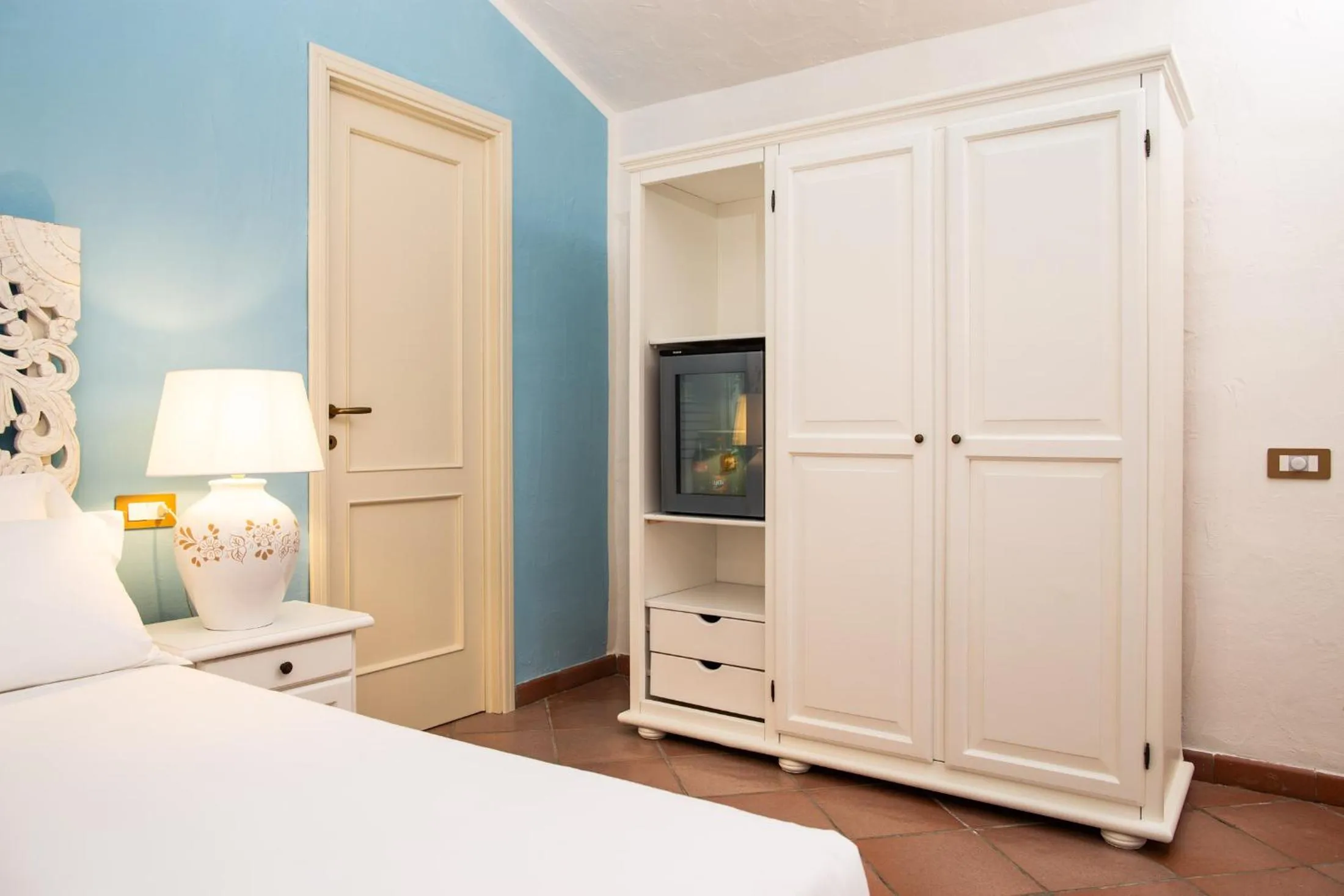 Bed in La Jacia Hotel & Resort