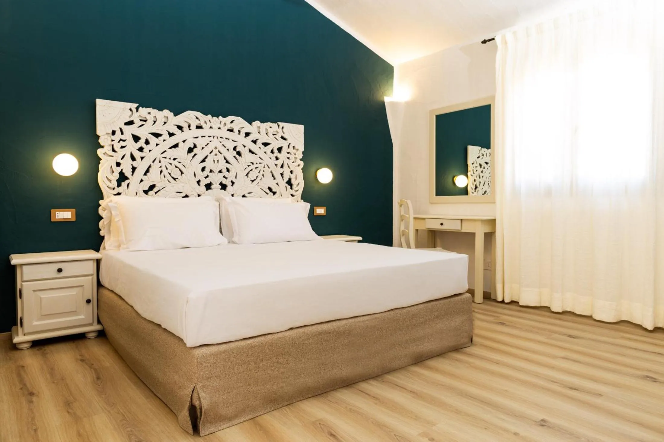 Bed in La Jacia Hotel & Resort