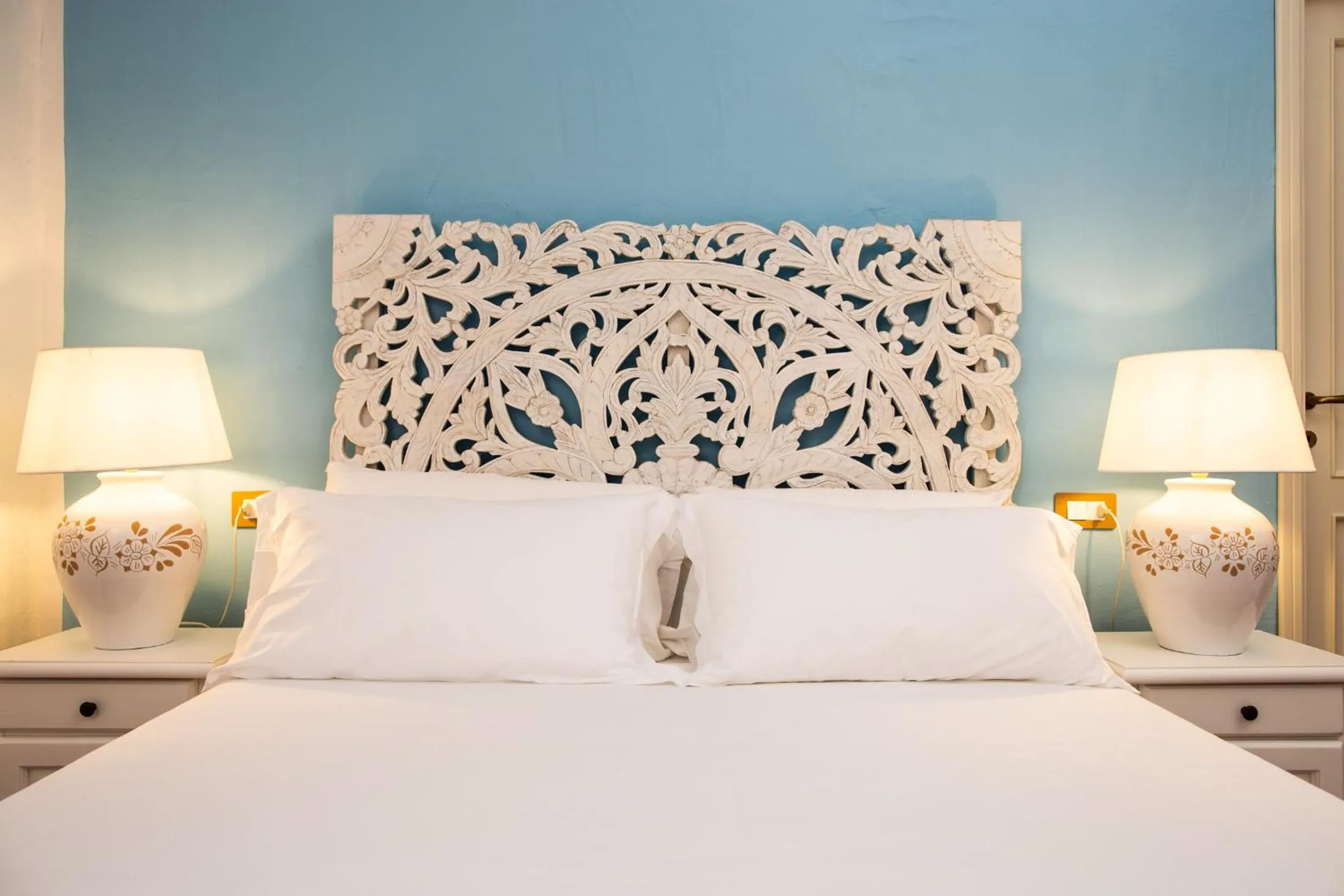 Bed in La Jacia Hotel & Resort