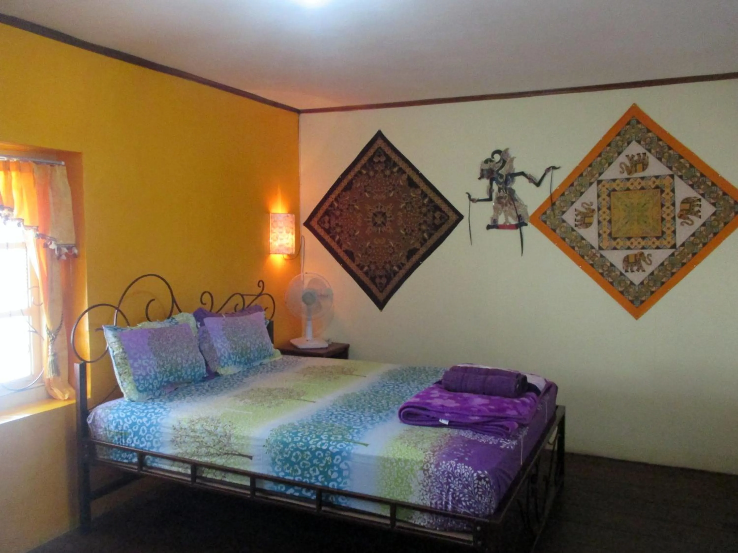 Queen Room with Shared Bathroom in MJR Ticketing Guest House