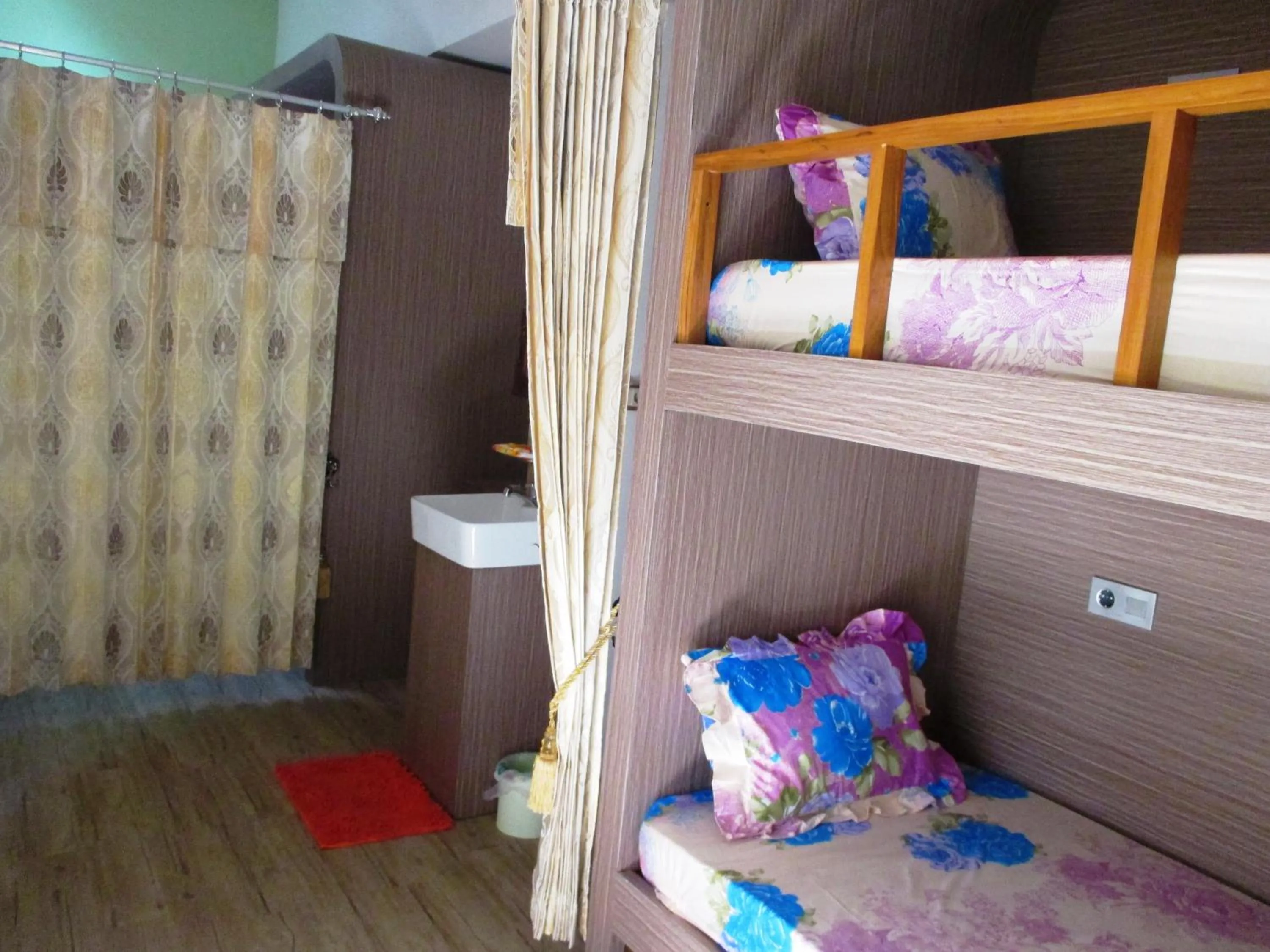 Bed in 4-Bed Mixed Dormitory Room in MJR Ticketing Guest House