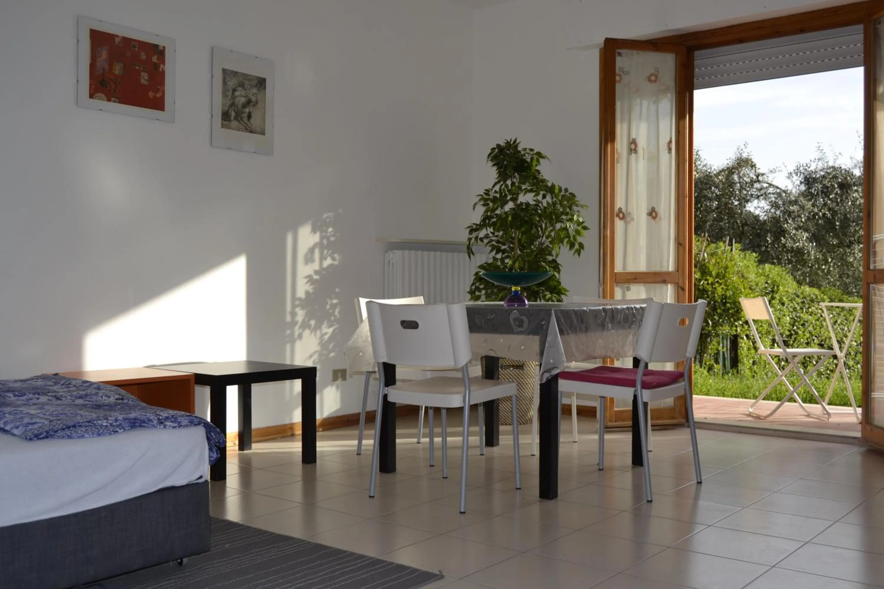 Dining area, Bed in Via Dante 10 Apartment
