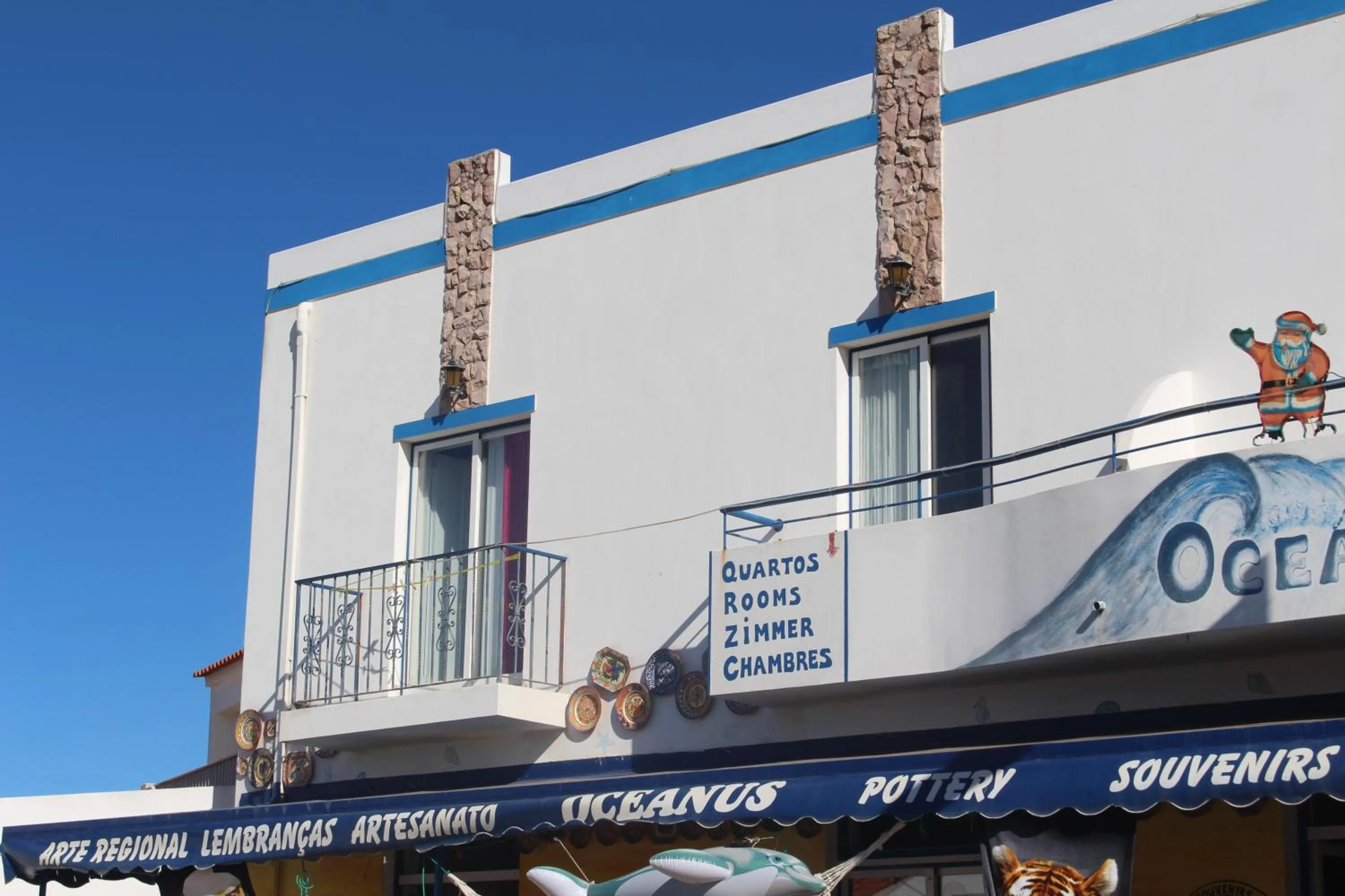 Facade/entrance in OCEANUS ROOM With private kitchen, bathroom and terrace 300m from the beach