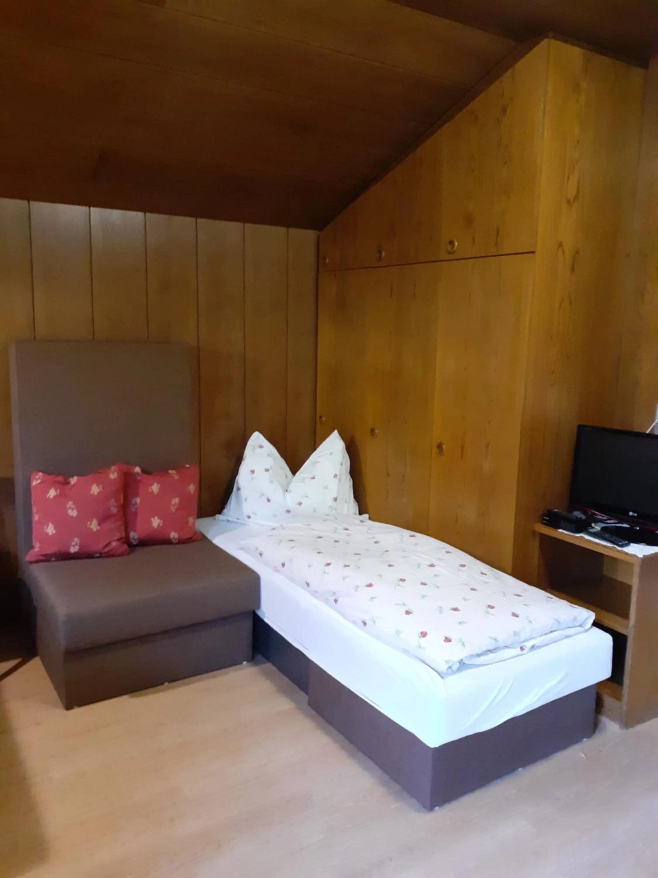 Living room, Bed in Residence Rienz