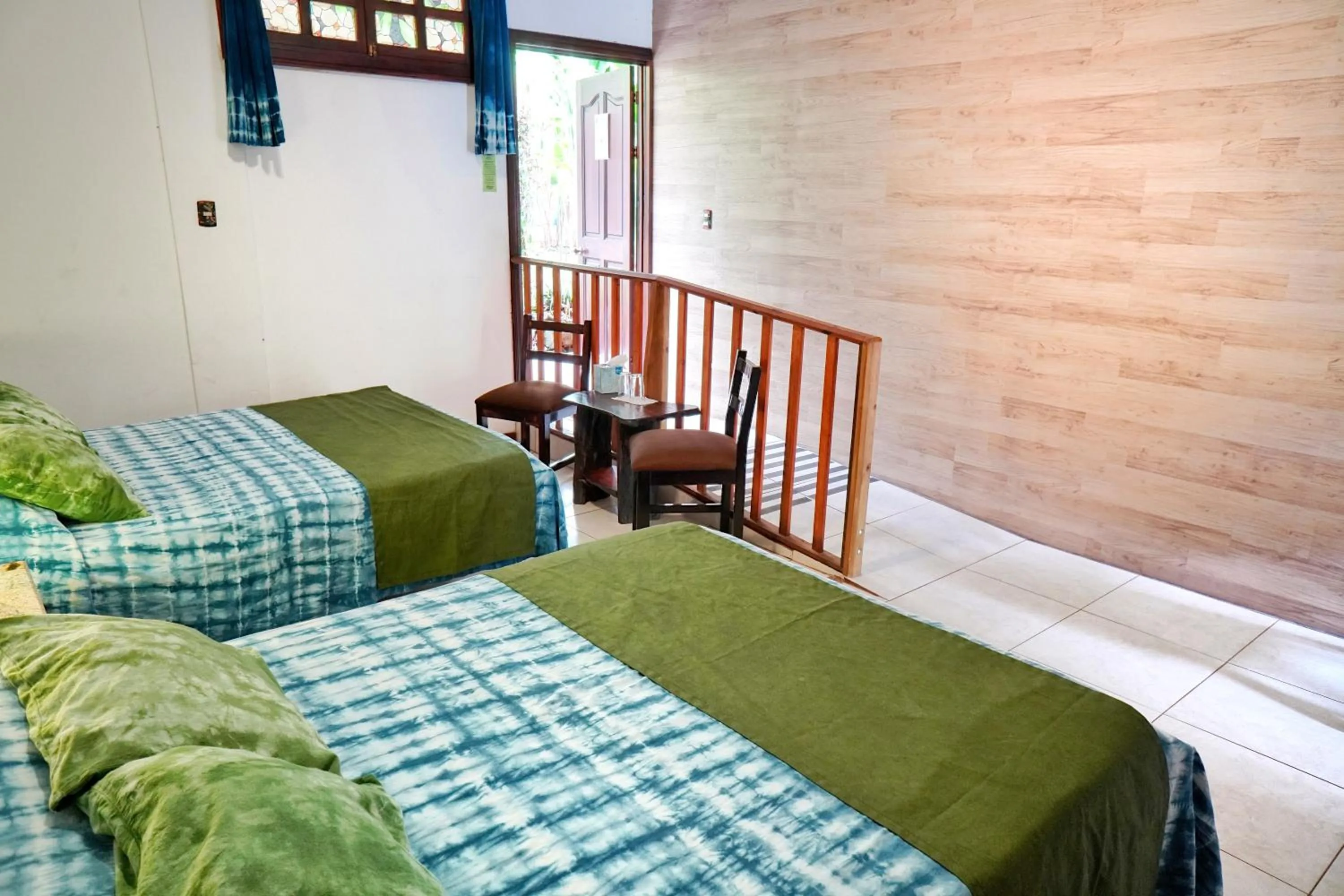 Bed in La Quinta Sarapiqui Lodge