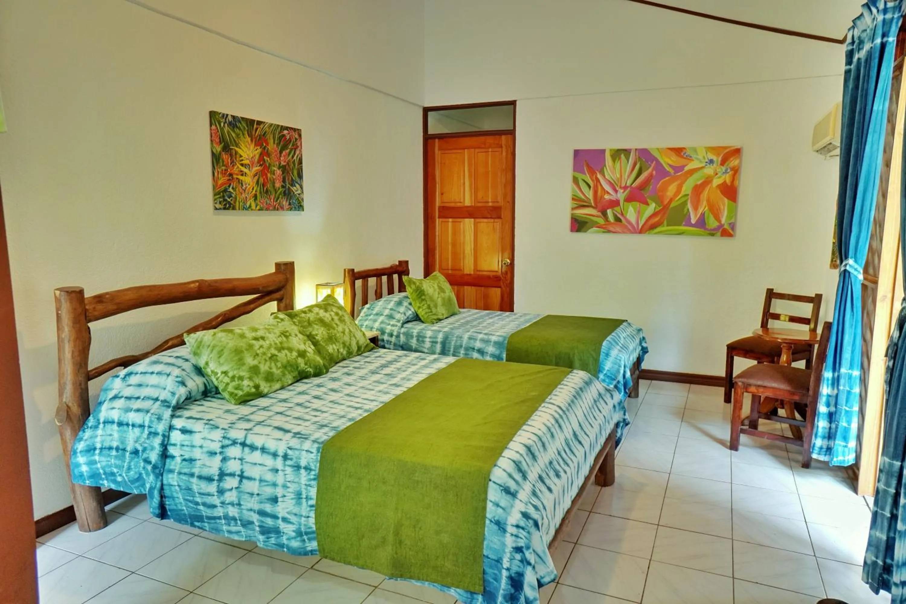 Bed in La Quinta Sarapiqui Lodge