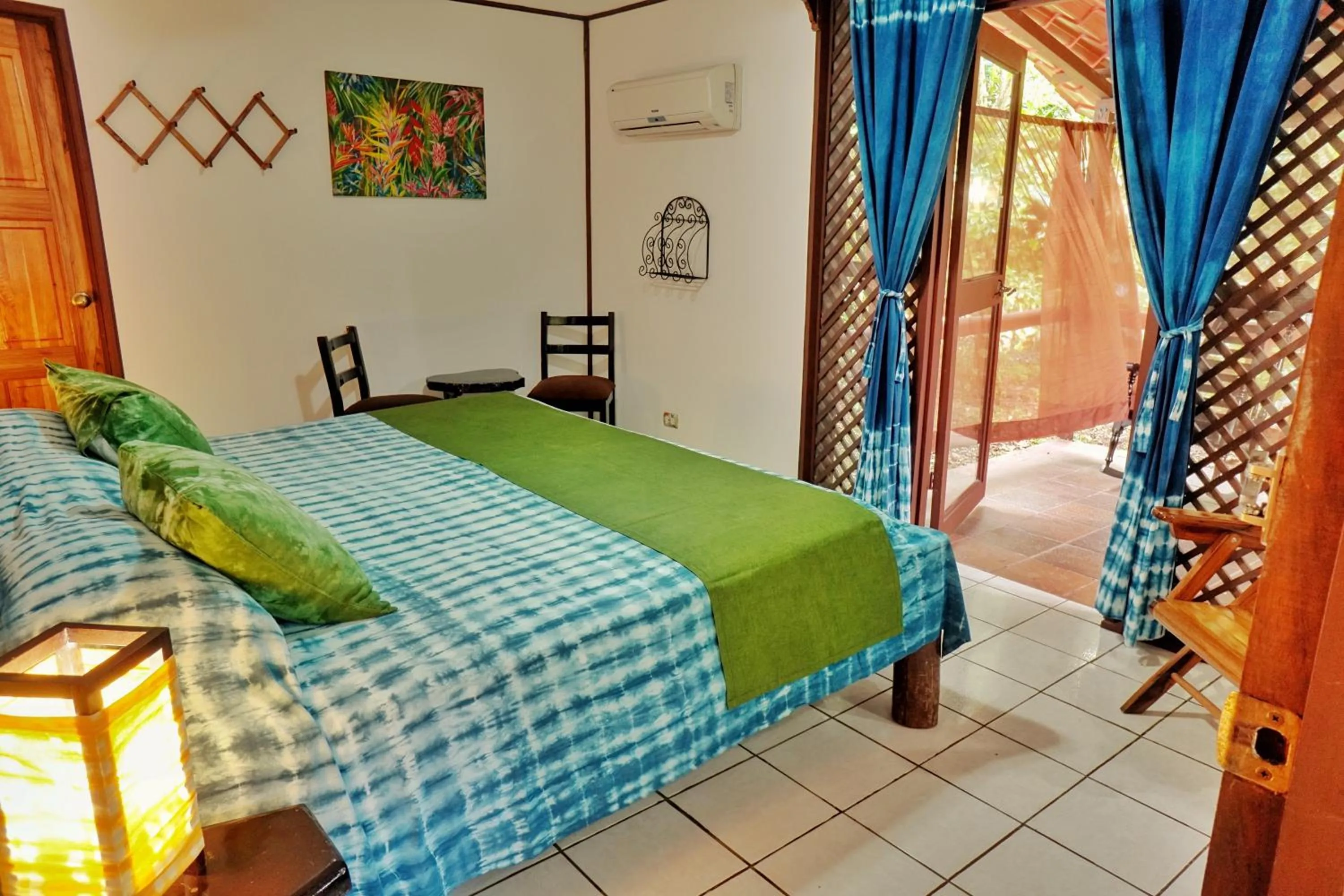 Bed in La Quinta Sarapiqui Lodge