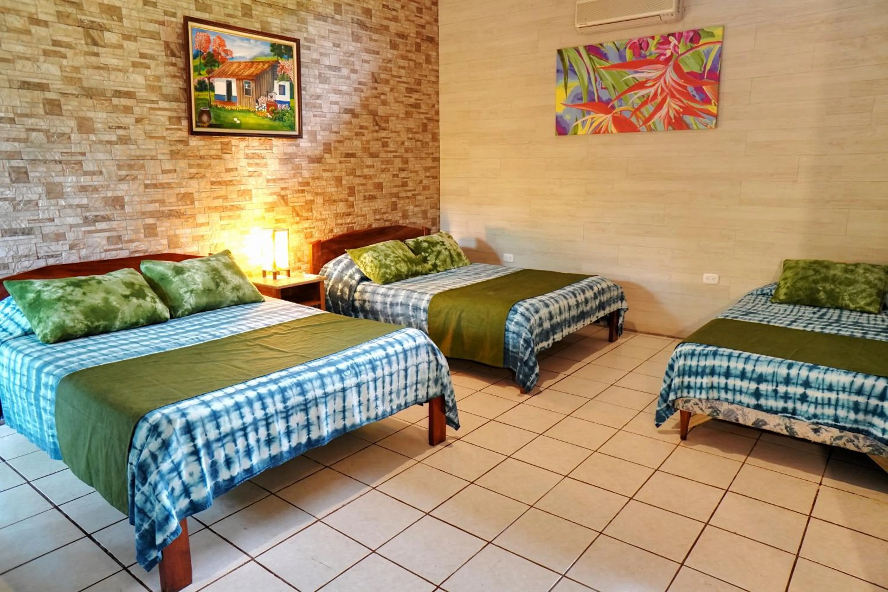 Bed in La Quinta Sarapiqui Lodge