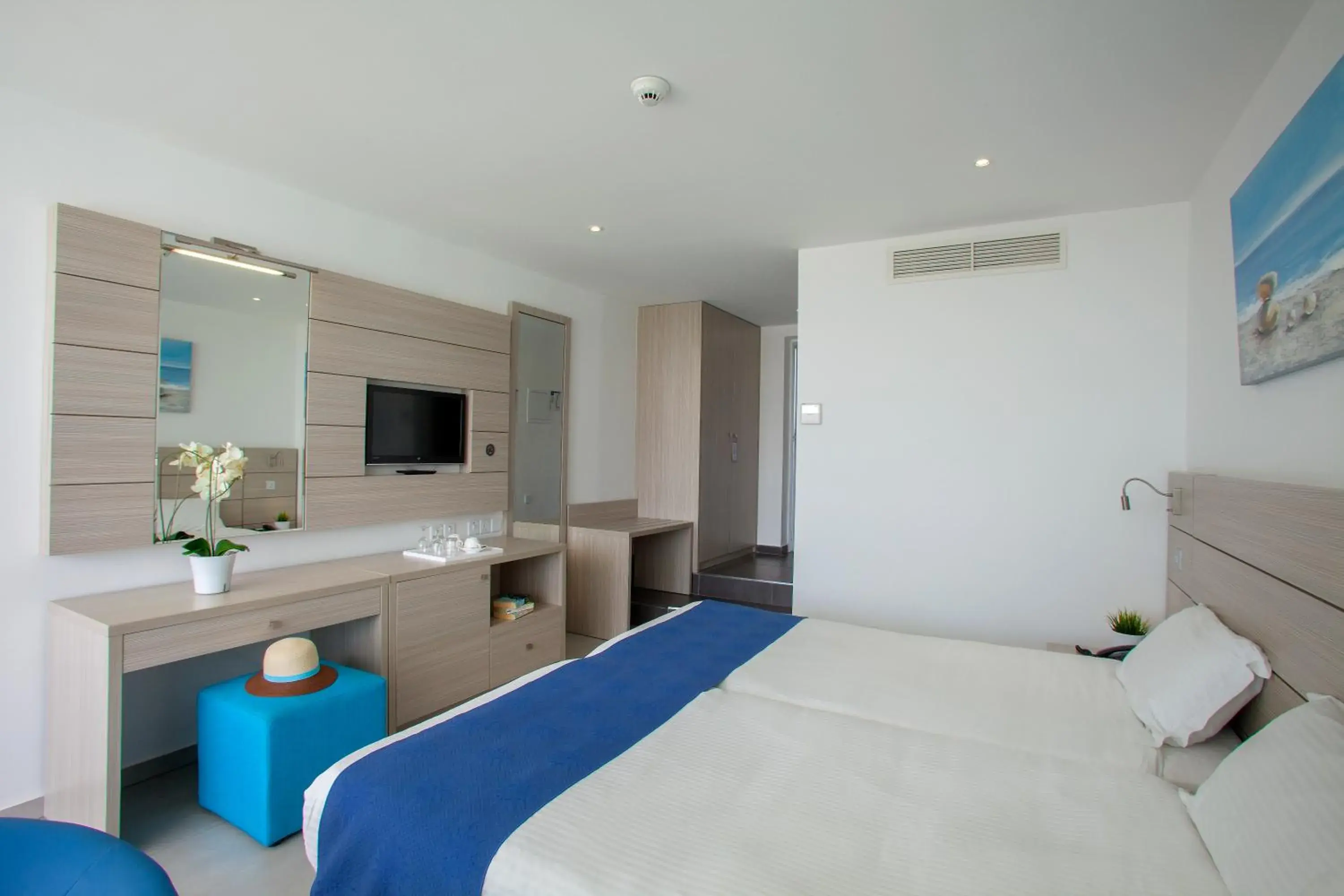 Bedroom, Bed in Limanaki Beach Hotel & Suites Bedroom, Bed in Limanaki Beach Hotel & Suites