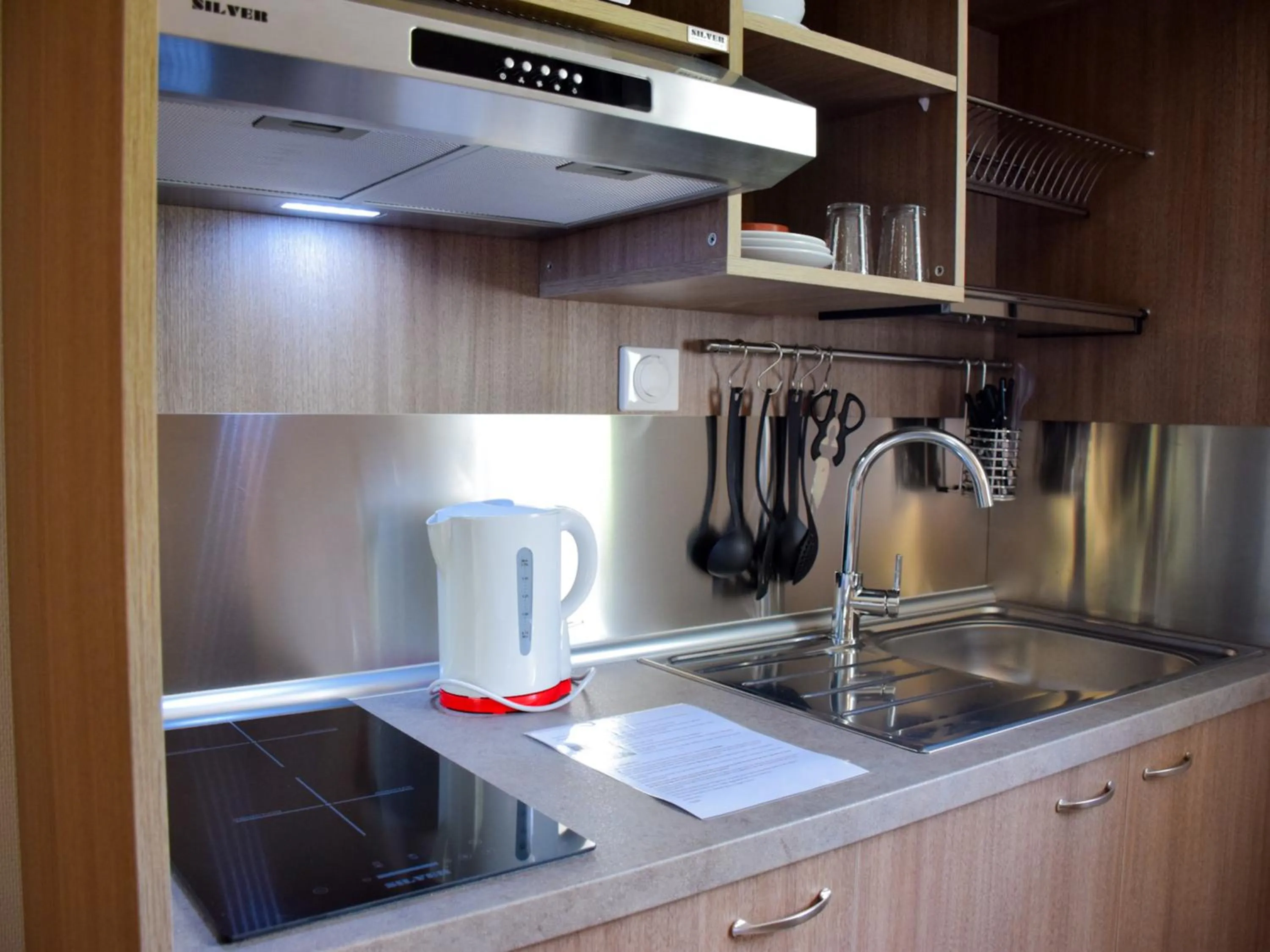 Kitchen or kitchenette in B&B HOTEL Aurillac Le Lioran