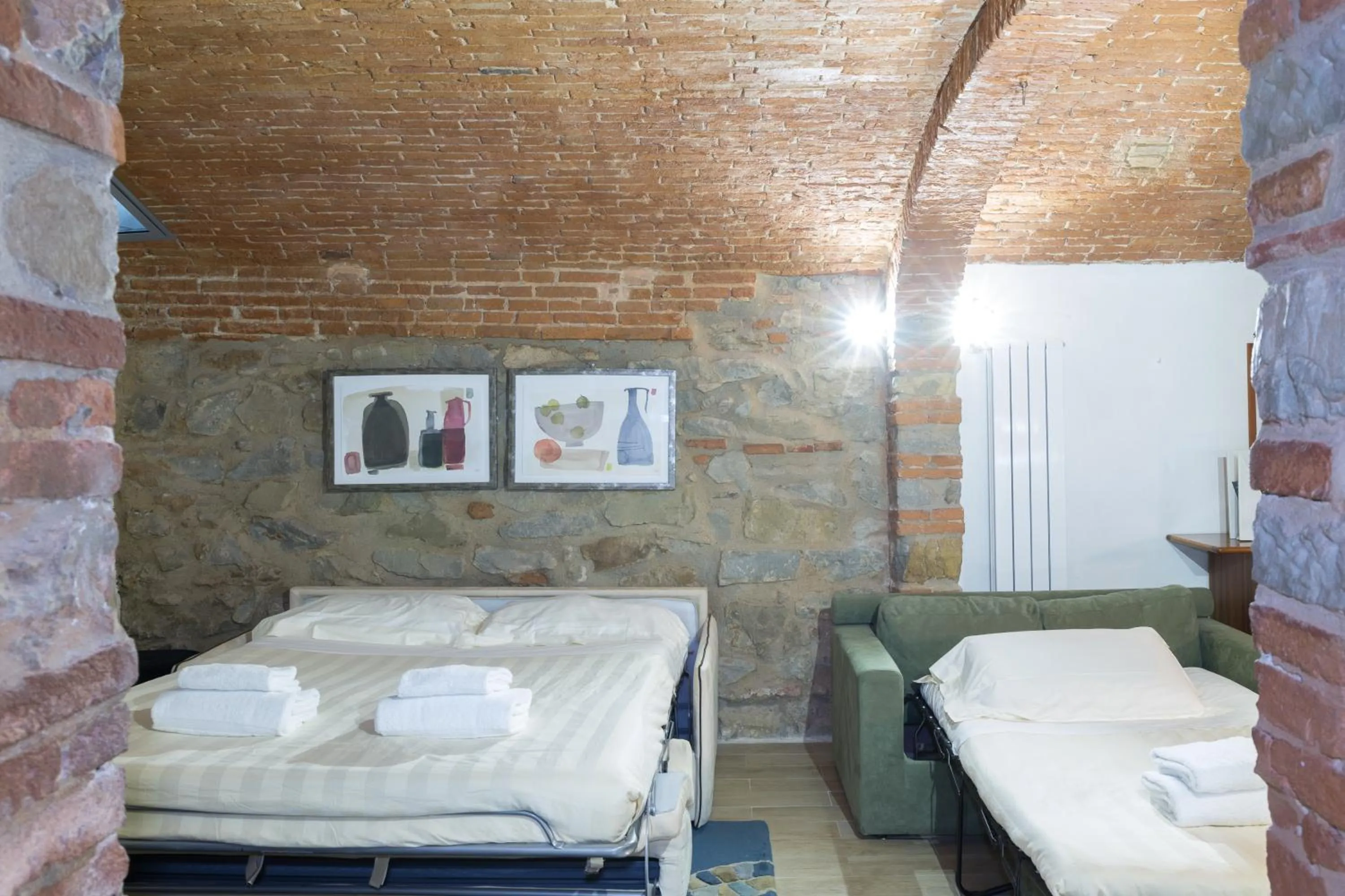 Bed in Giglio Apartments by Mmega