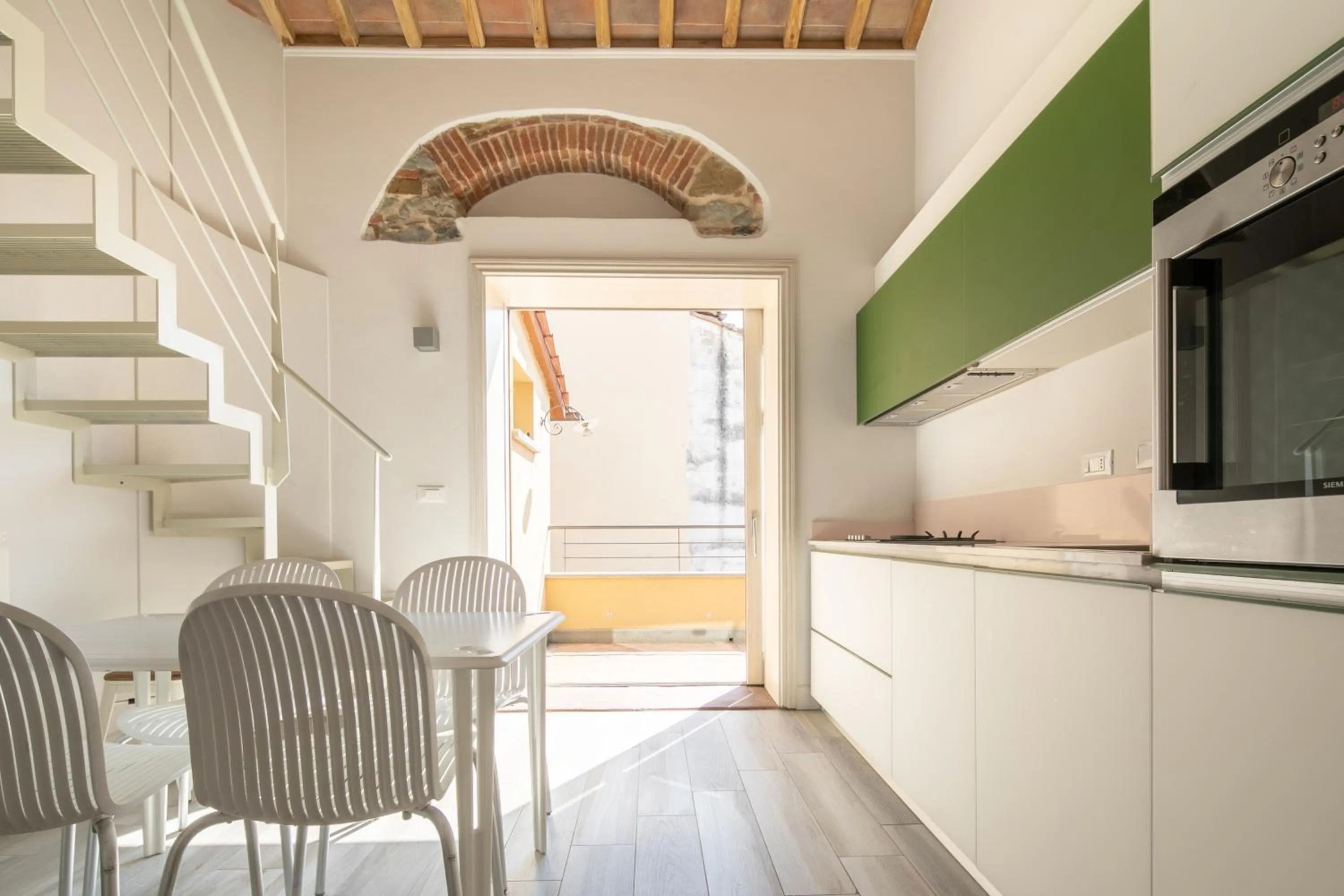 Kitchen or kitchenette in Giglio Apartments by Mmega