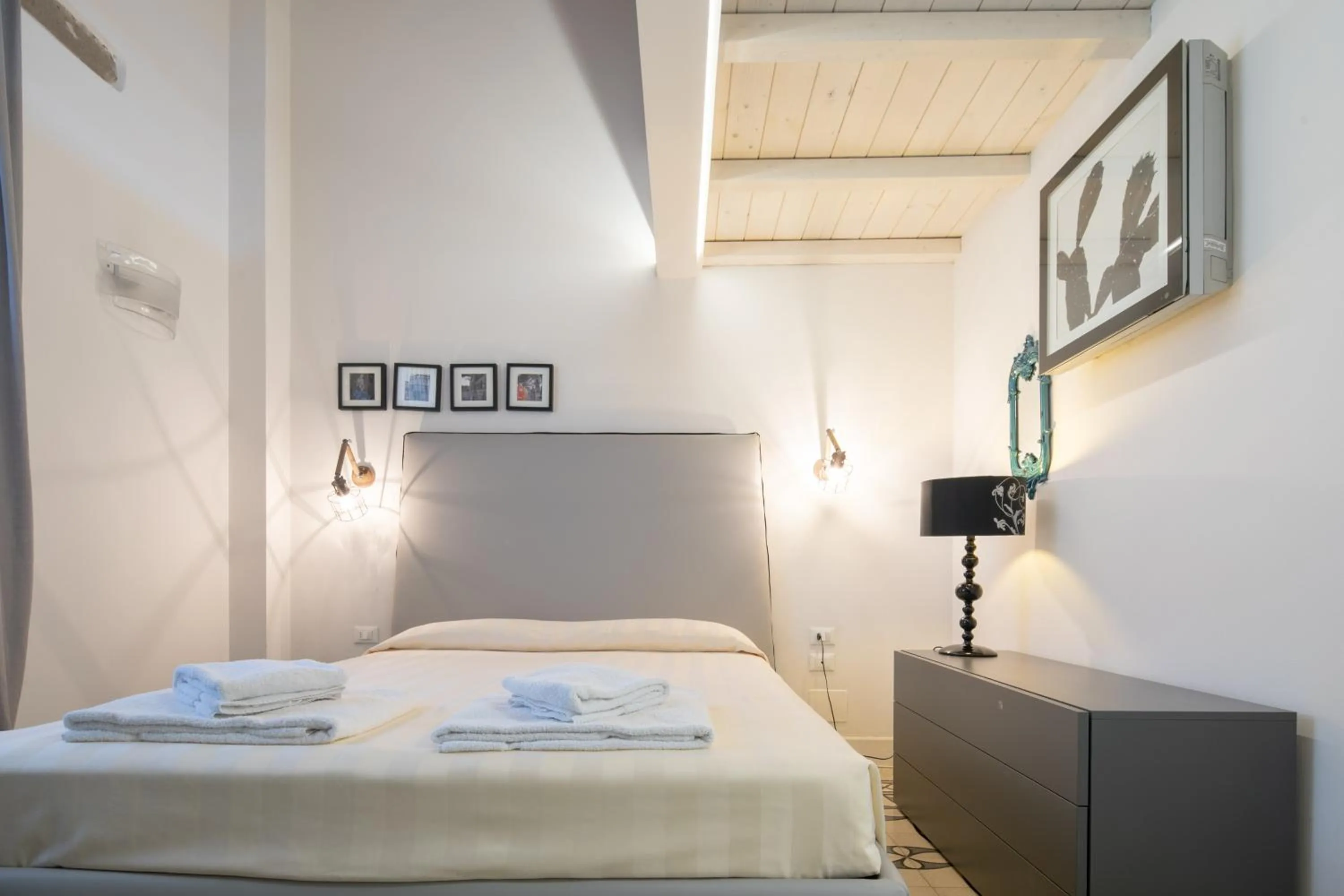 Bed in Giglio Apartments by Mmega